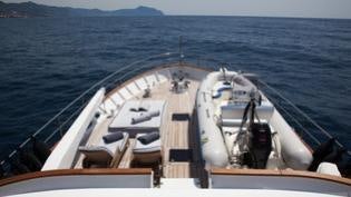 a large ship on the water aboard PERSUADER Yacht for Charter