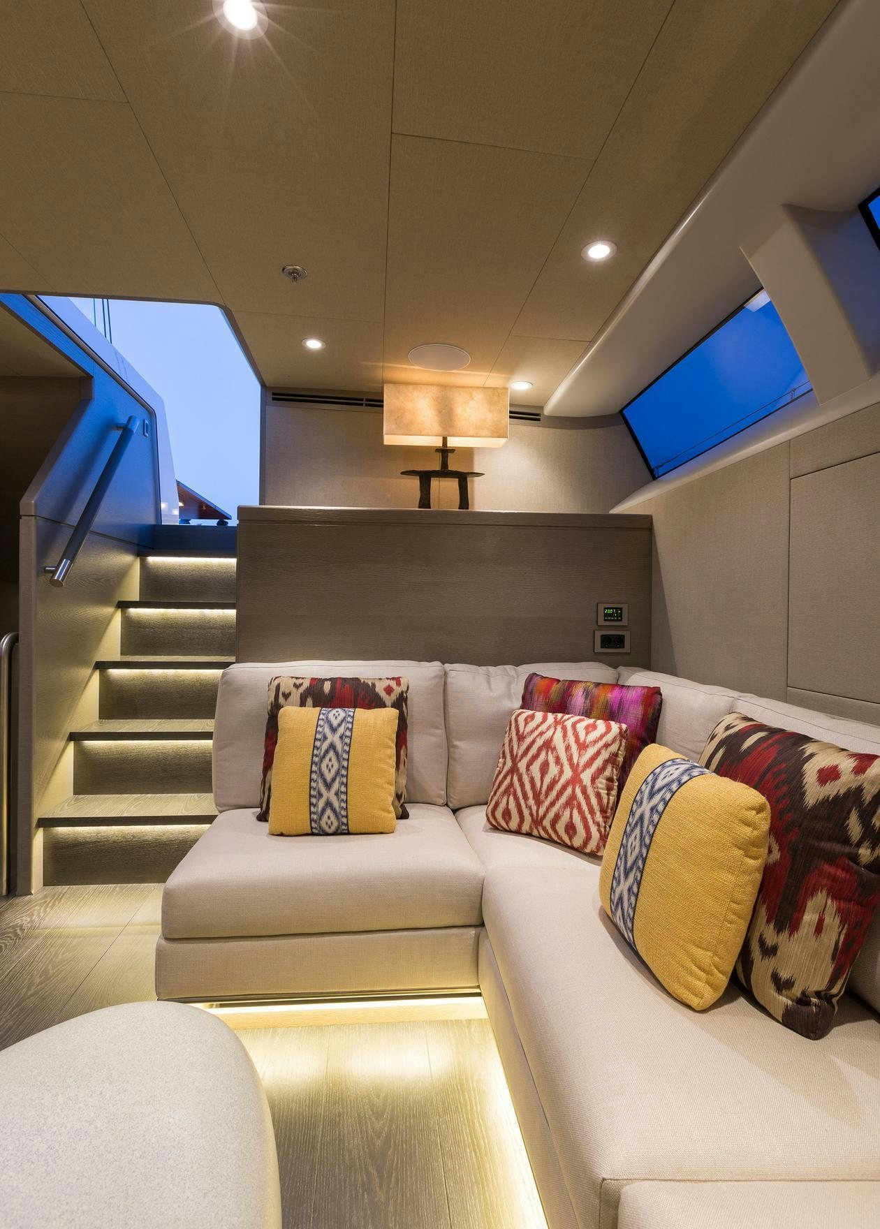 a living room with a large tv aboard INUKSHUK Yacht for Charter