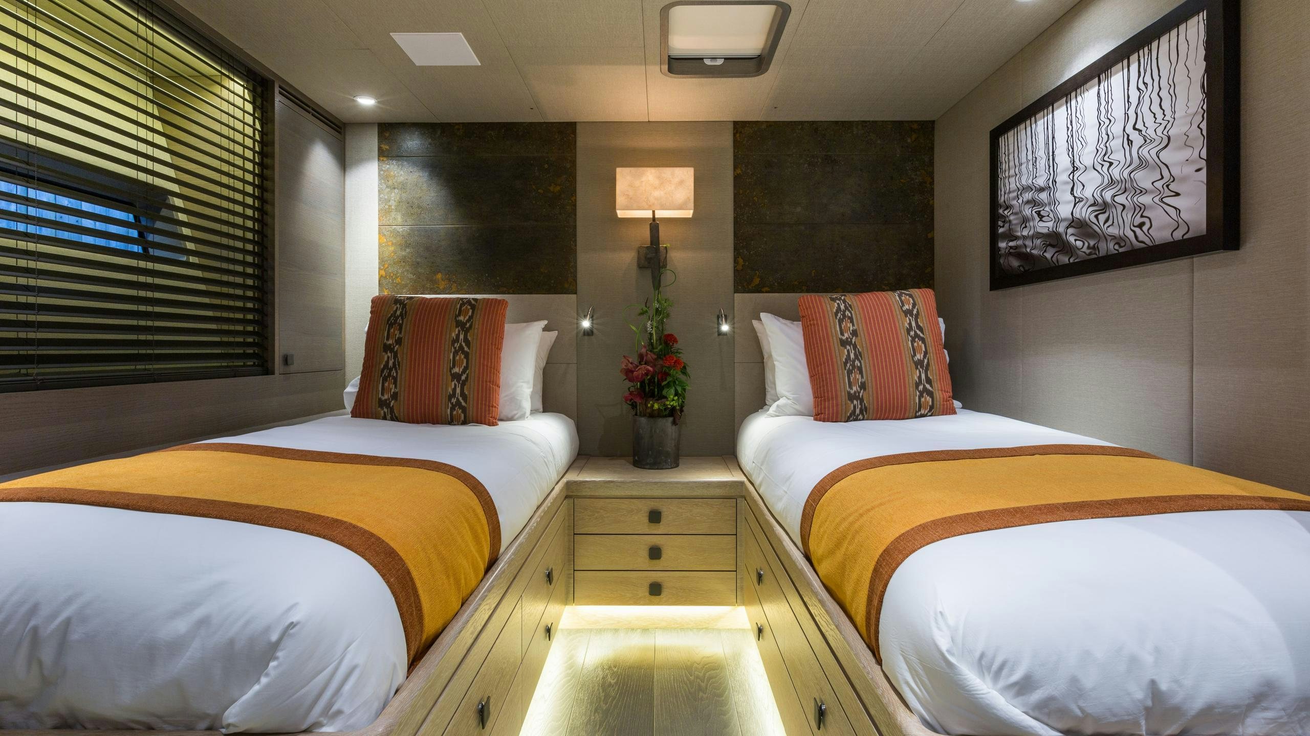 a room with two beds aboard INUKSHUK Yacht for Charter
