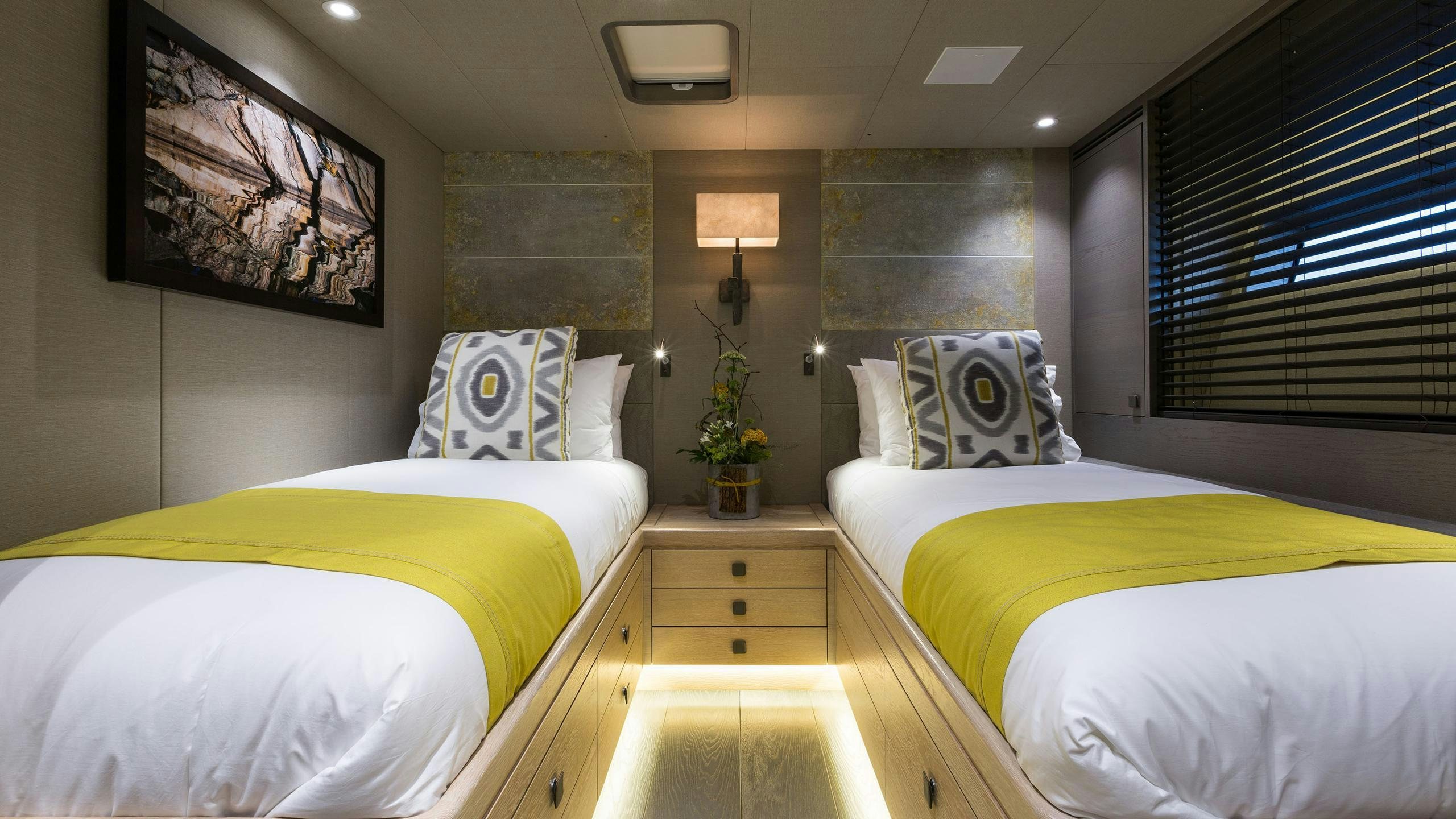 a room with two beds aboard INUKSHUK Yacht for Charter