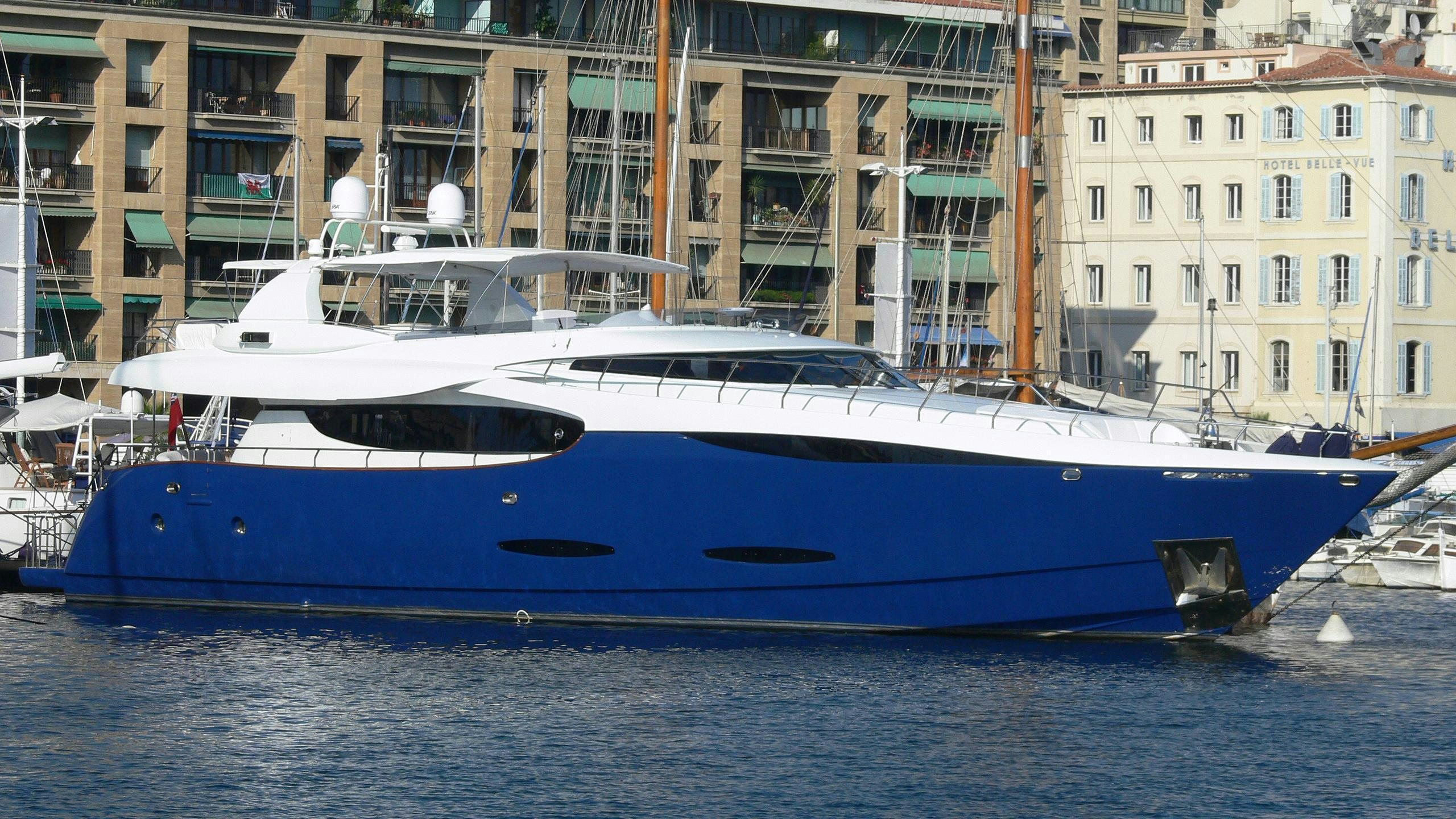 a boat docked in a harbor aboard CLARITY Yacht for Charter