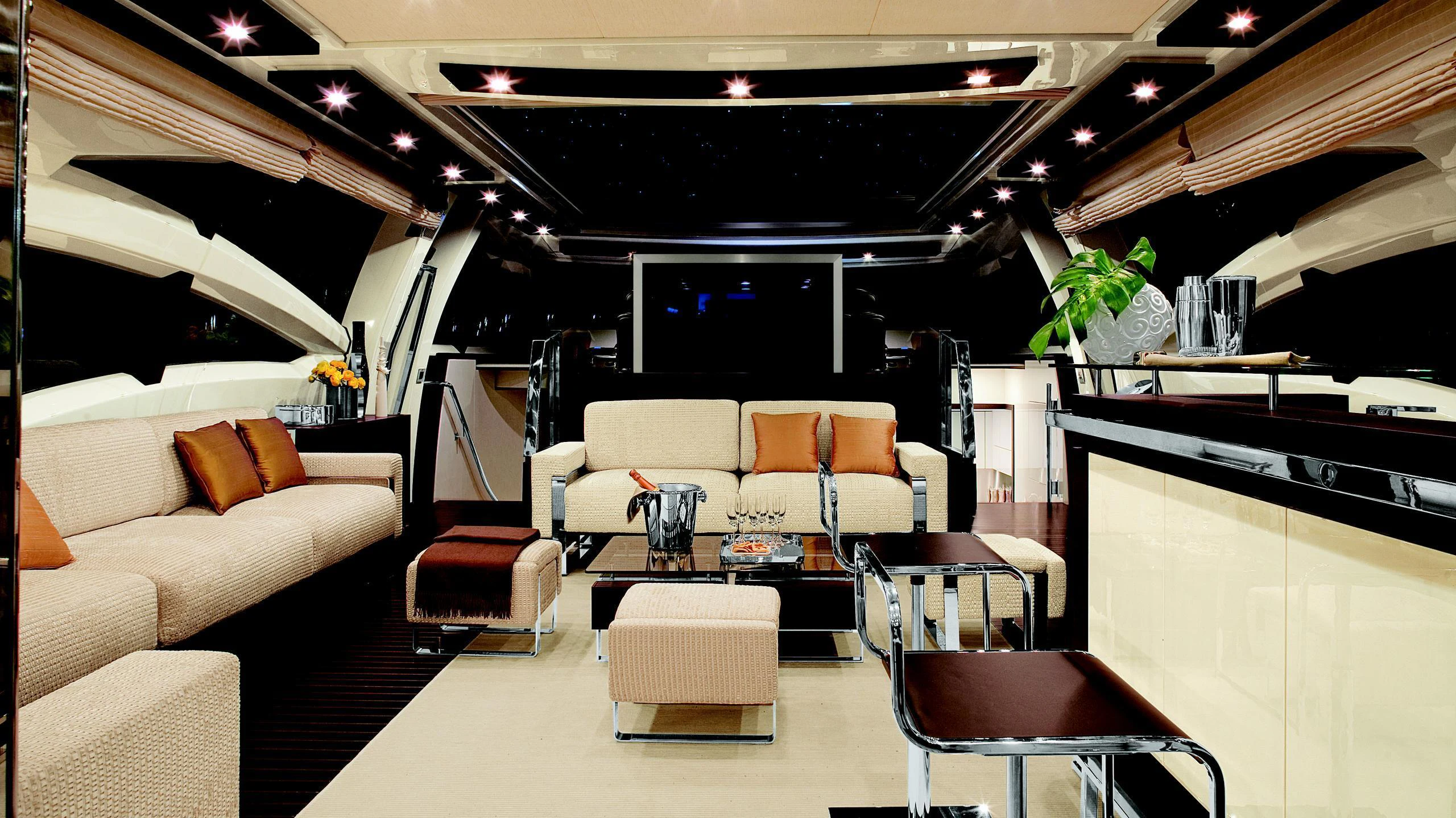 a room with a couch and a table aboard DUKE Yacht for Charter