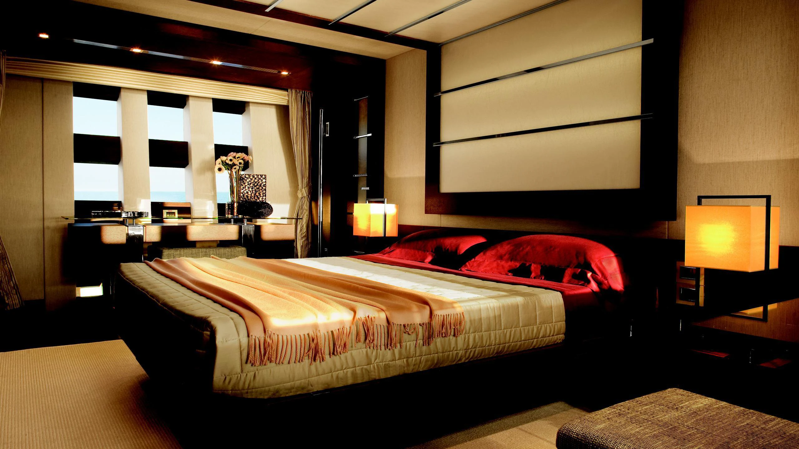 a bed in a room aboard DUKE Yacht for Charter