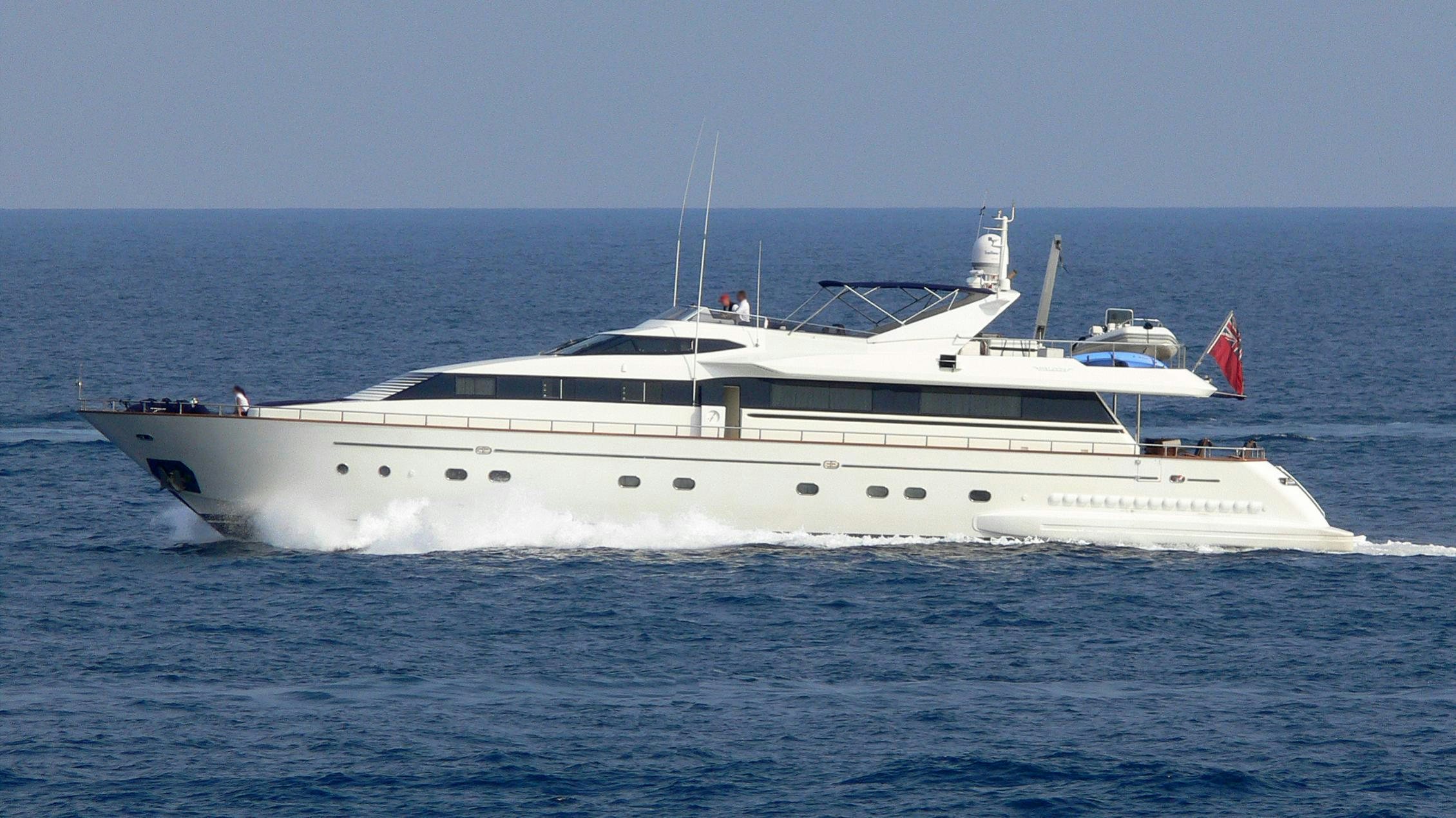 a large white yacht aboard OBSESSION Yacht for Charter