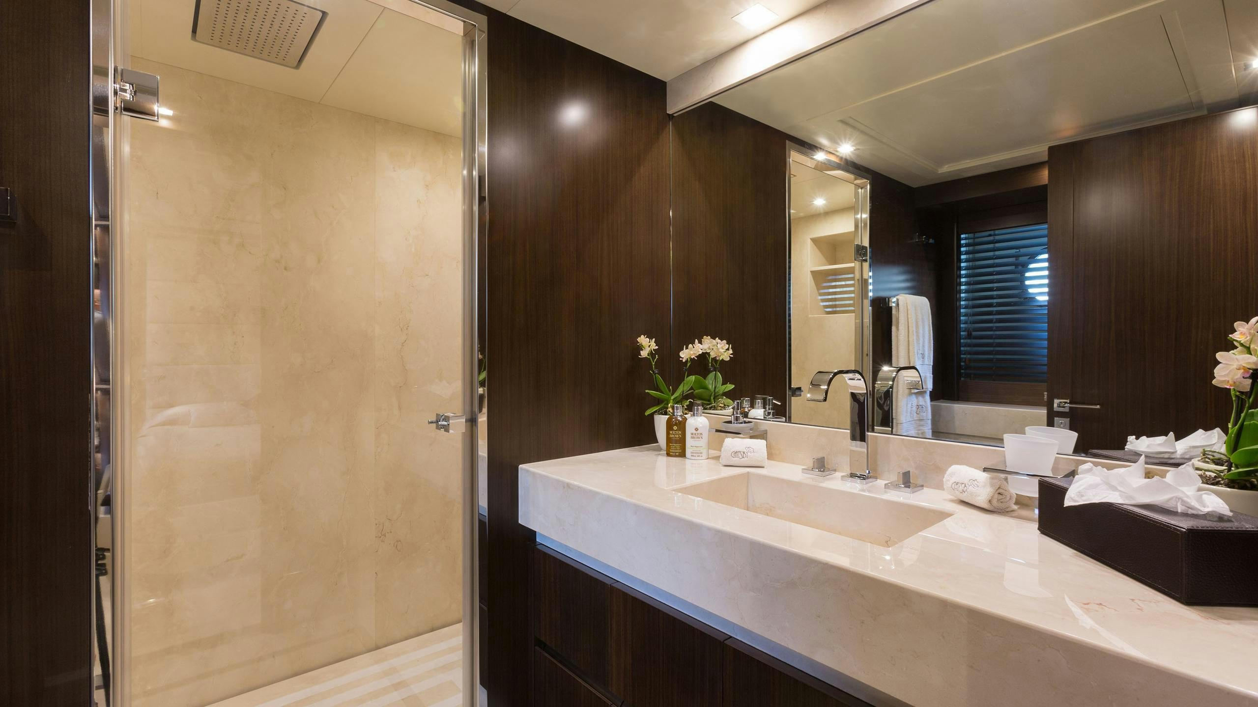 a bathroom with a large shower aboard GATSBY Yacht for Charter