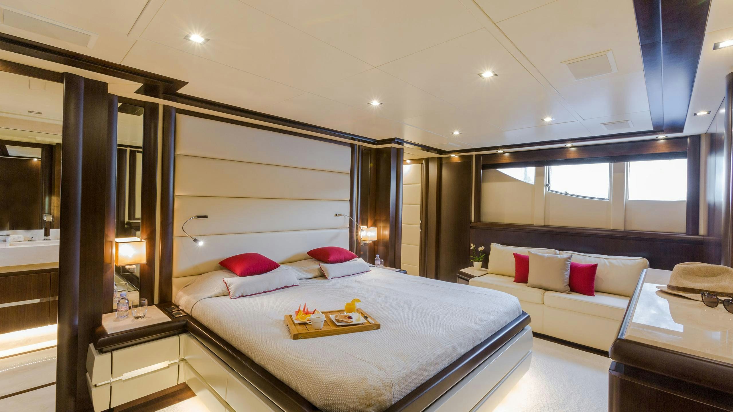a modern bedroom with a bed aboard GATSBY Yacht for Charter