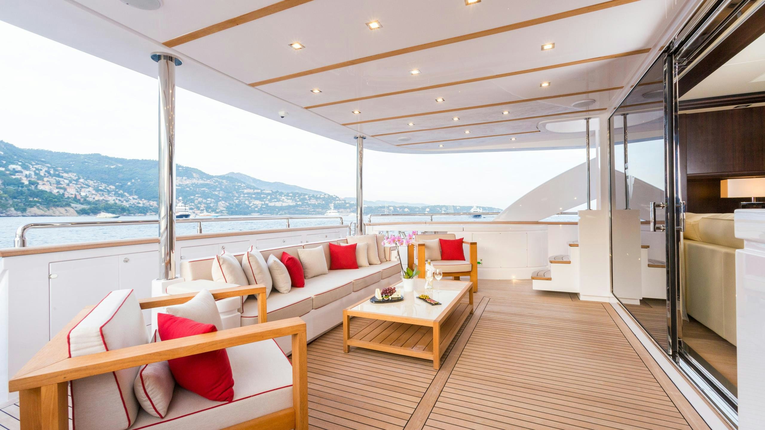 a living room with a view of the ocean aboard GATSBY Yacht for Charter