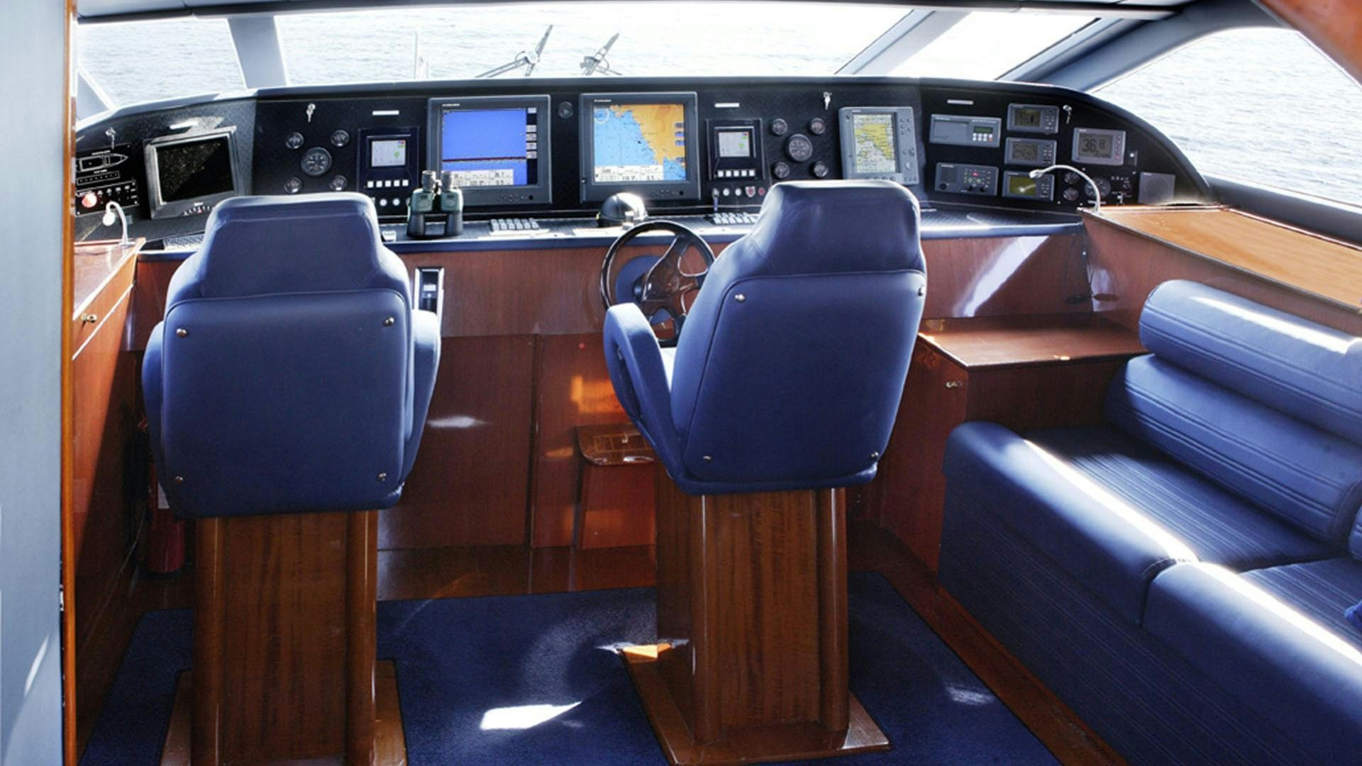 a chair in a cockpit aboard DREAM B Yacht for Charter