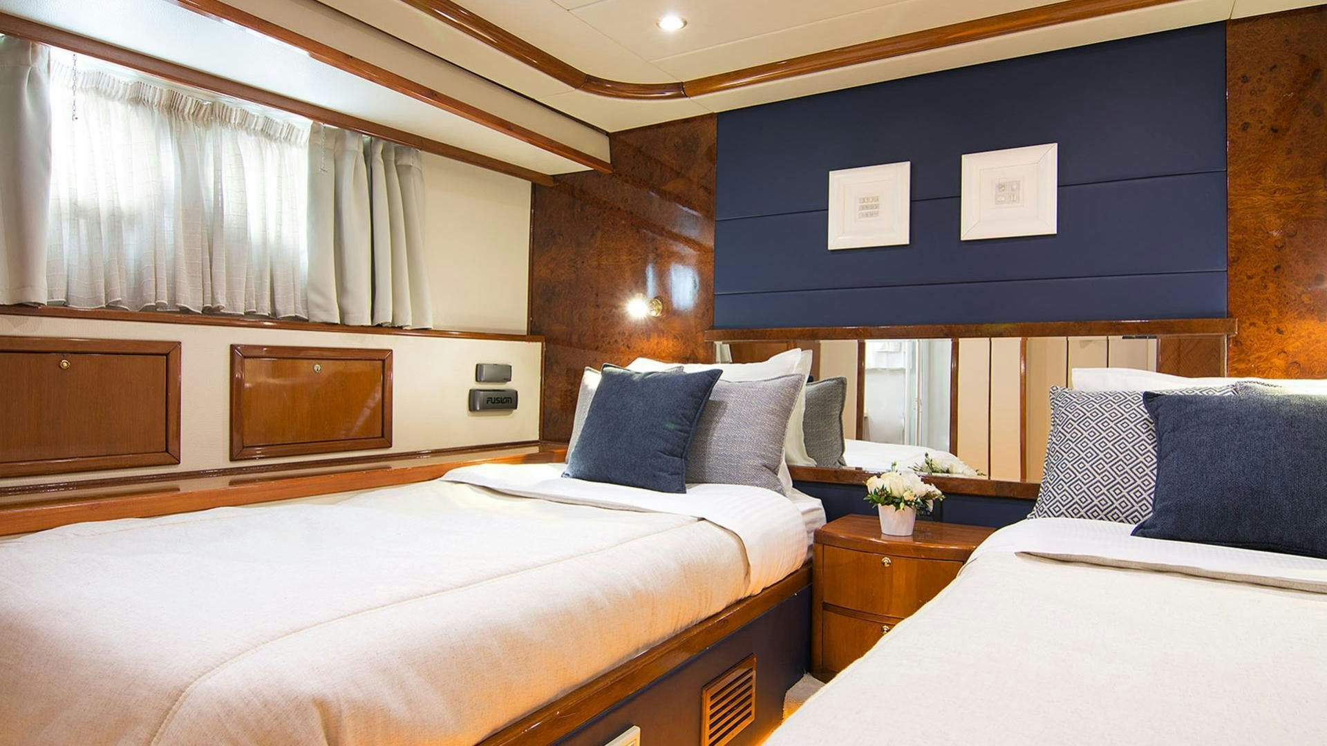 a room with two beds aboard DREAM B Yacht for Charter