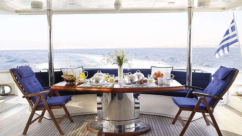a table with food on it aboard DREAM B Yacht for Charter