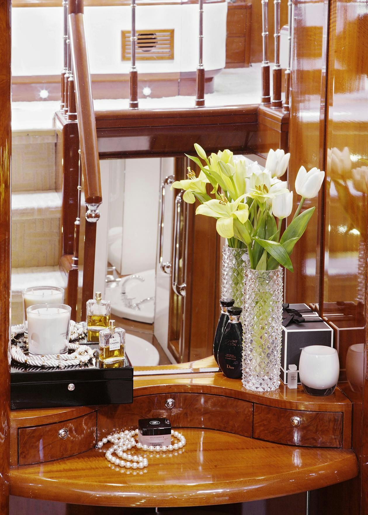 a vase of flowers sits on a counter top aboard DREAM B Yacht for Charter