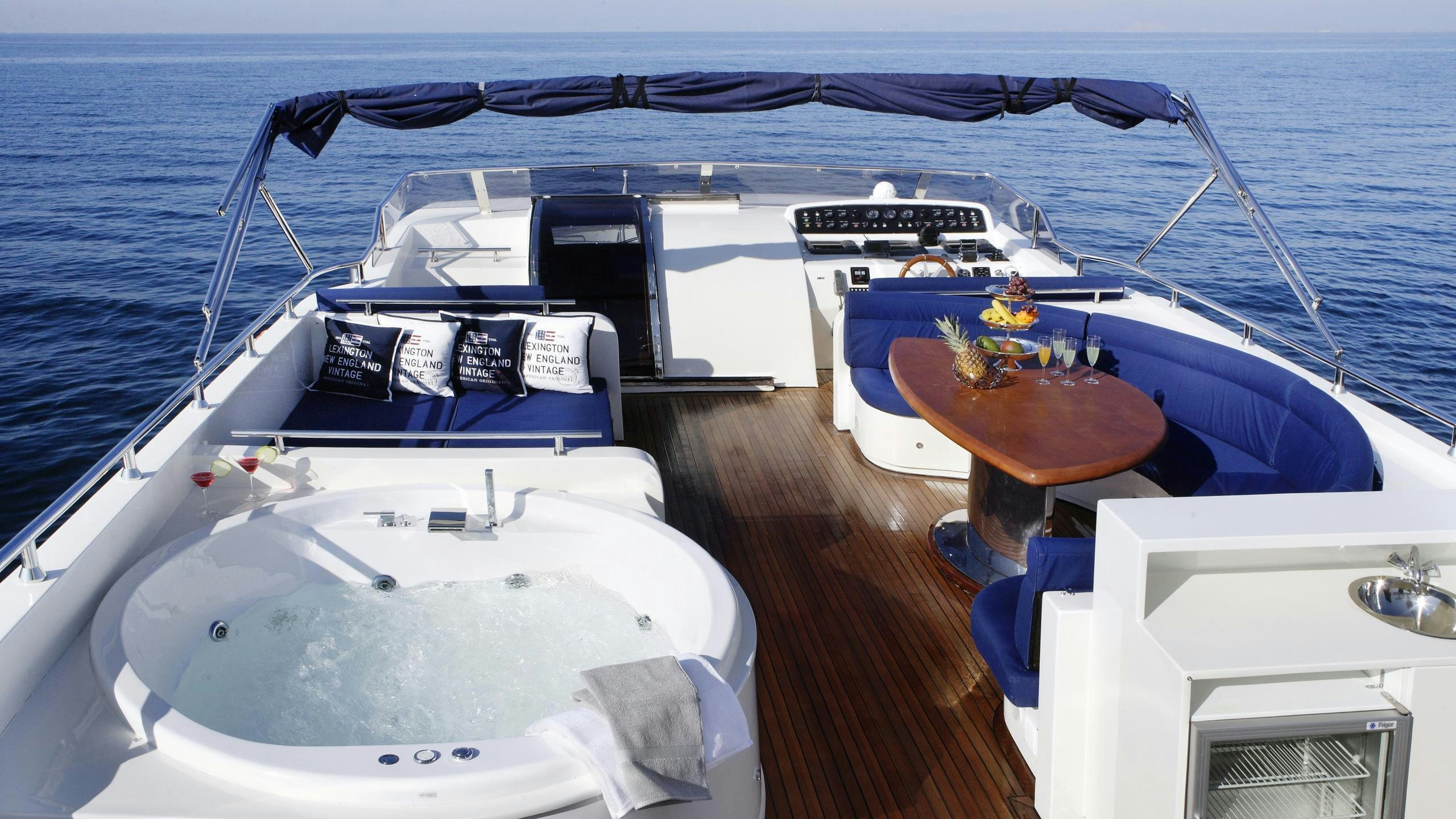 a boat on a dock aboard DREAM B Yacht for Charter