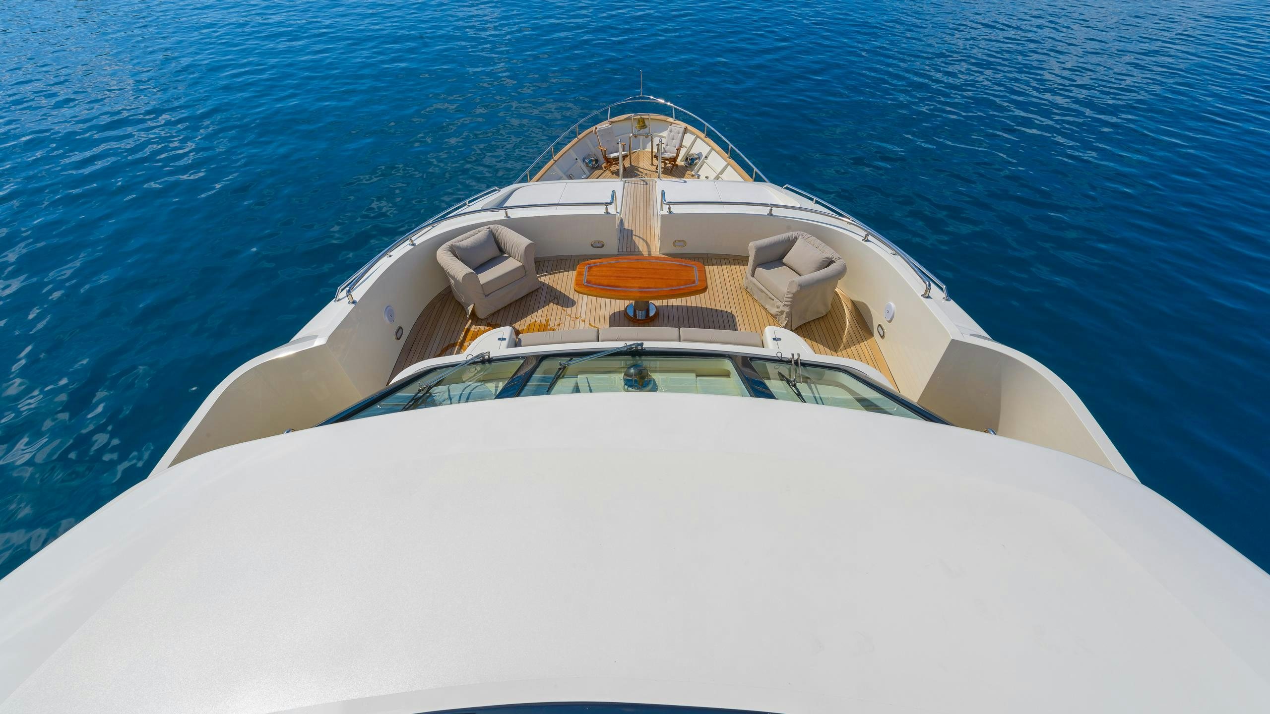 a white yacht on the water aboard NOVELA Yacht for Charter