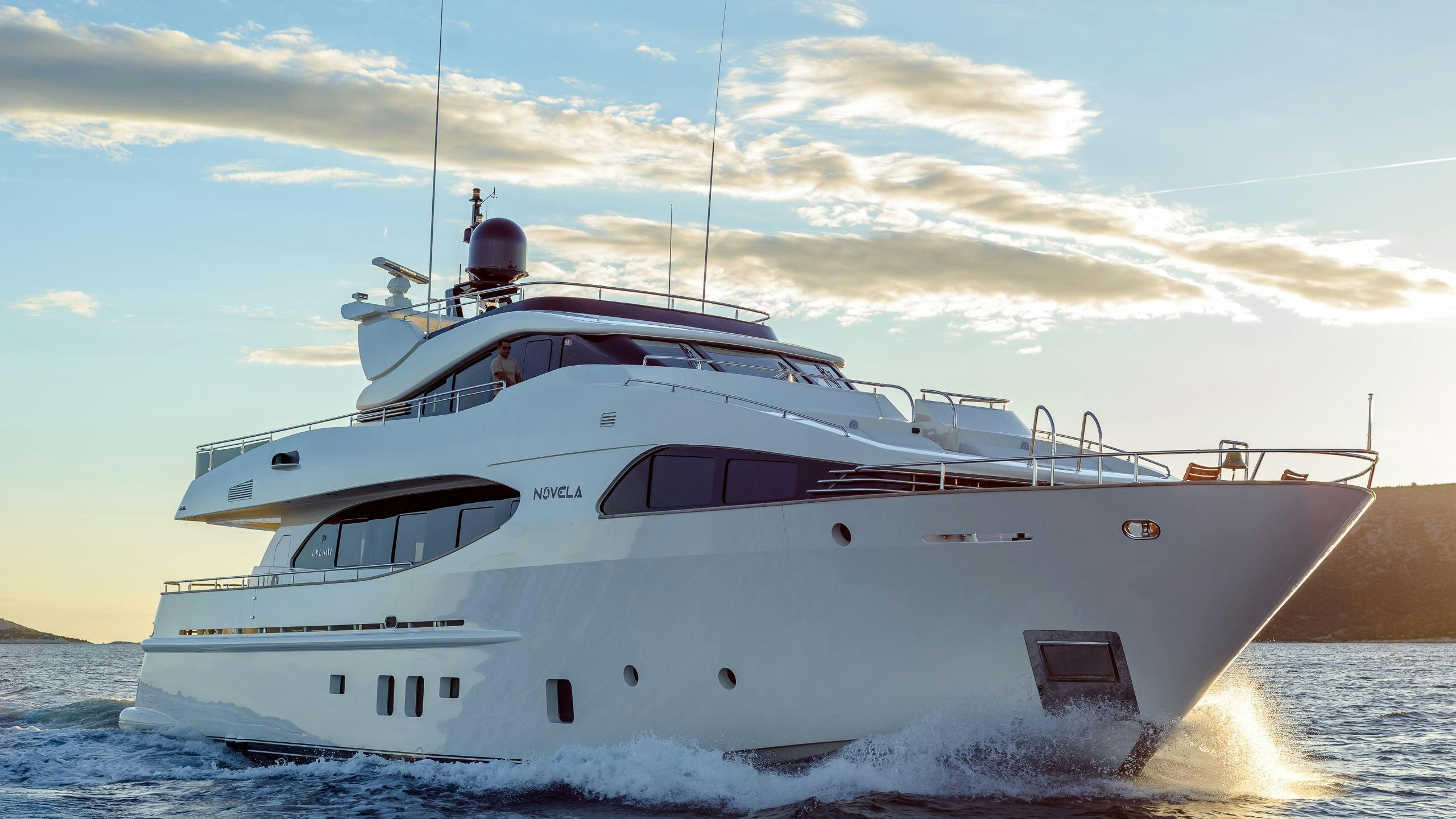 a white yacht on the water aboard NOVELA Yacht for Charter