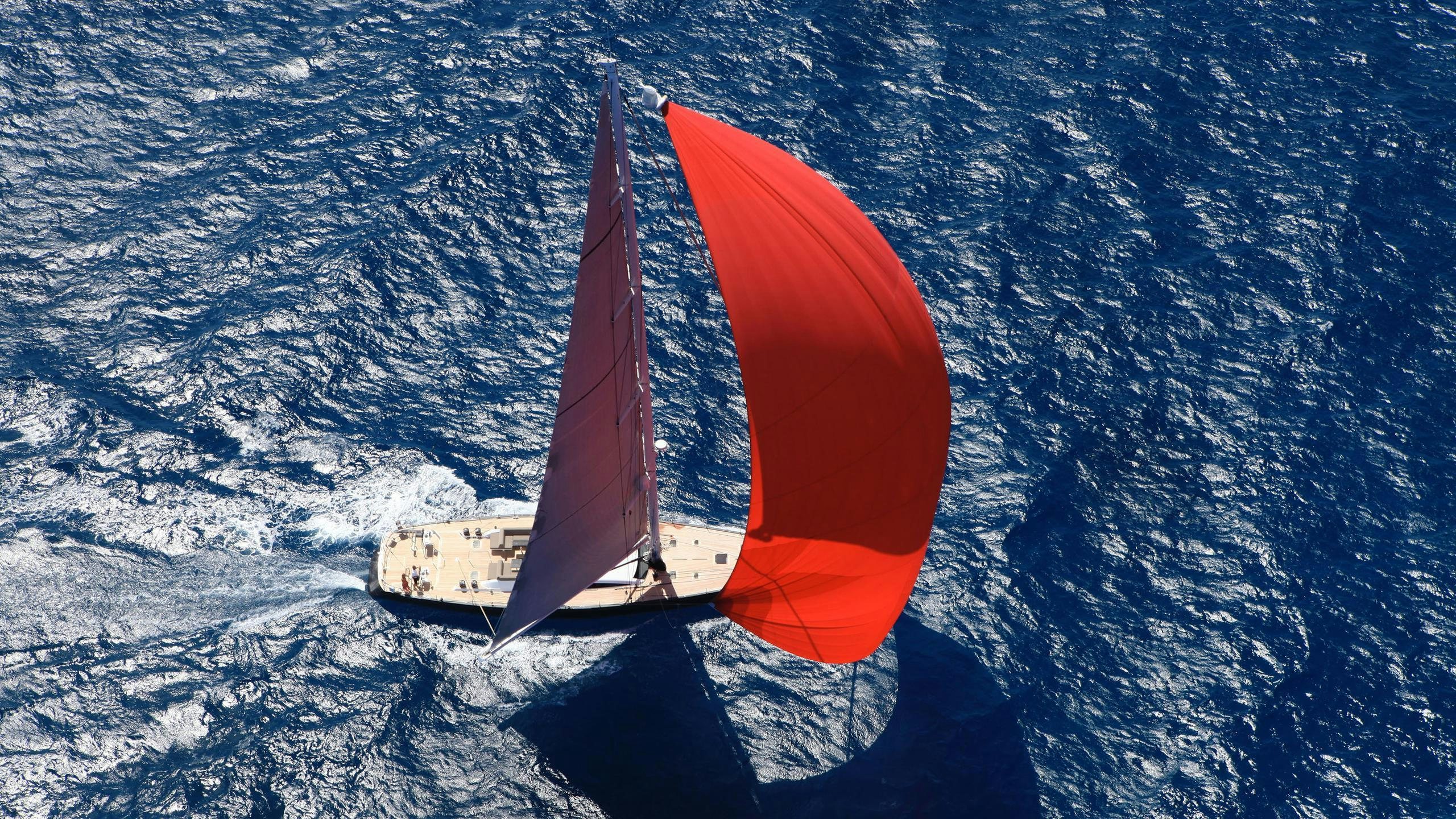 a space shuttle flying over a planet aboard YCH2 Yacht for Charter