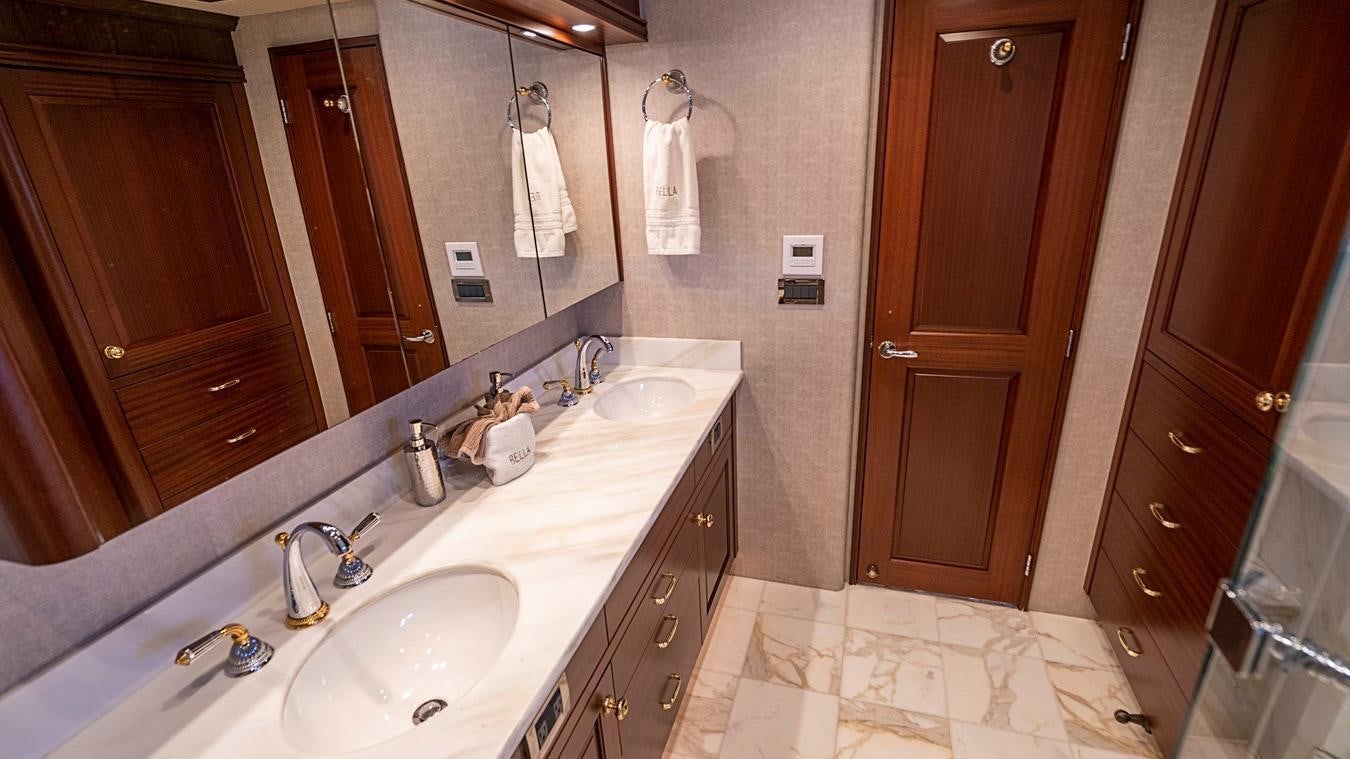 a bathroom with a large mirror aboard TRANQUILITY Yacht for Charter