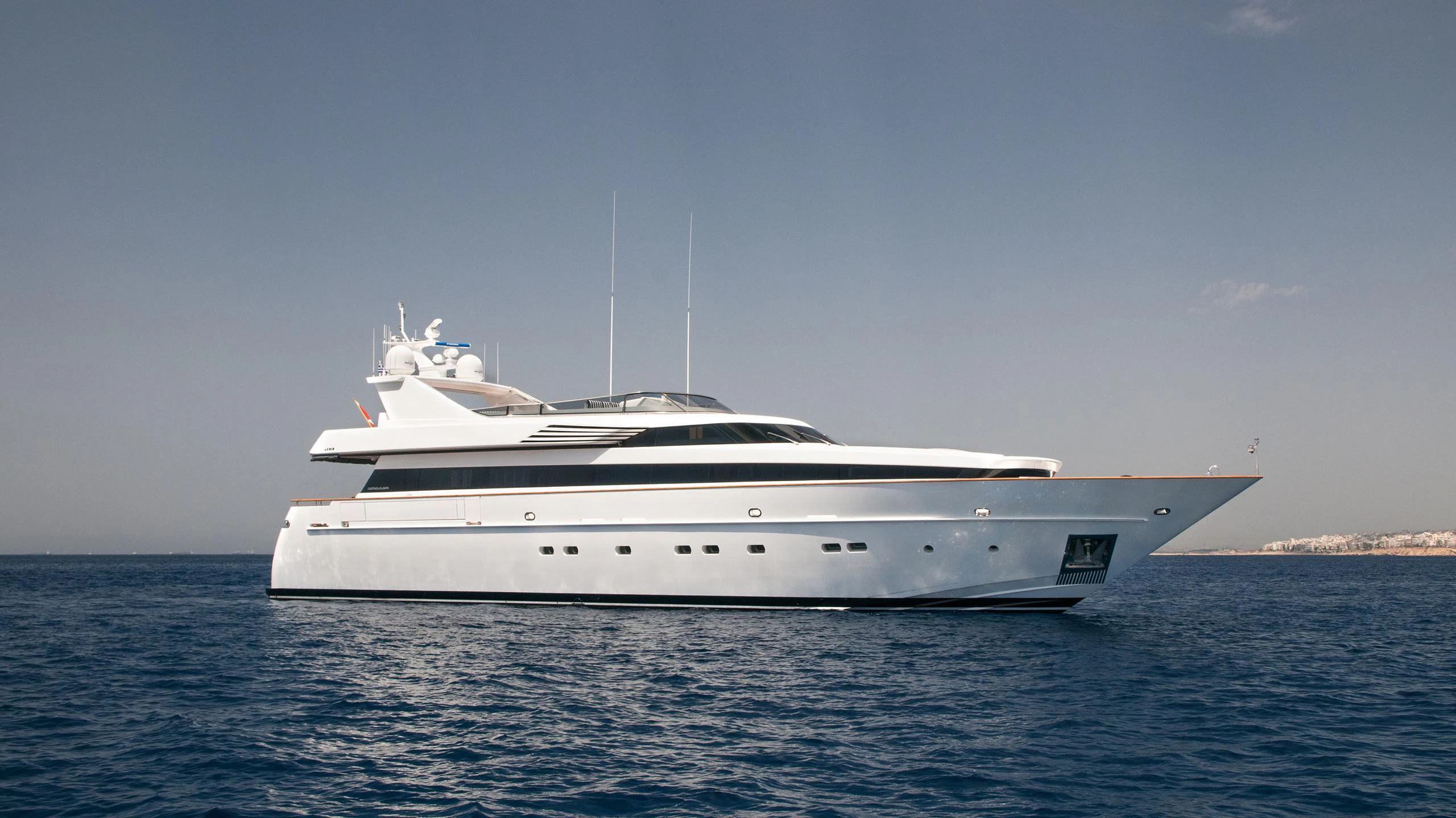 a white yacht in the water aboard REGINA K Yacht for Charter