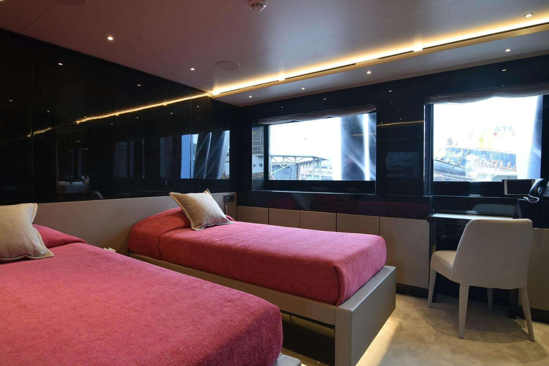 a room with two beds aboard MY EDEN Yacht for Charter