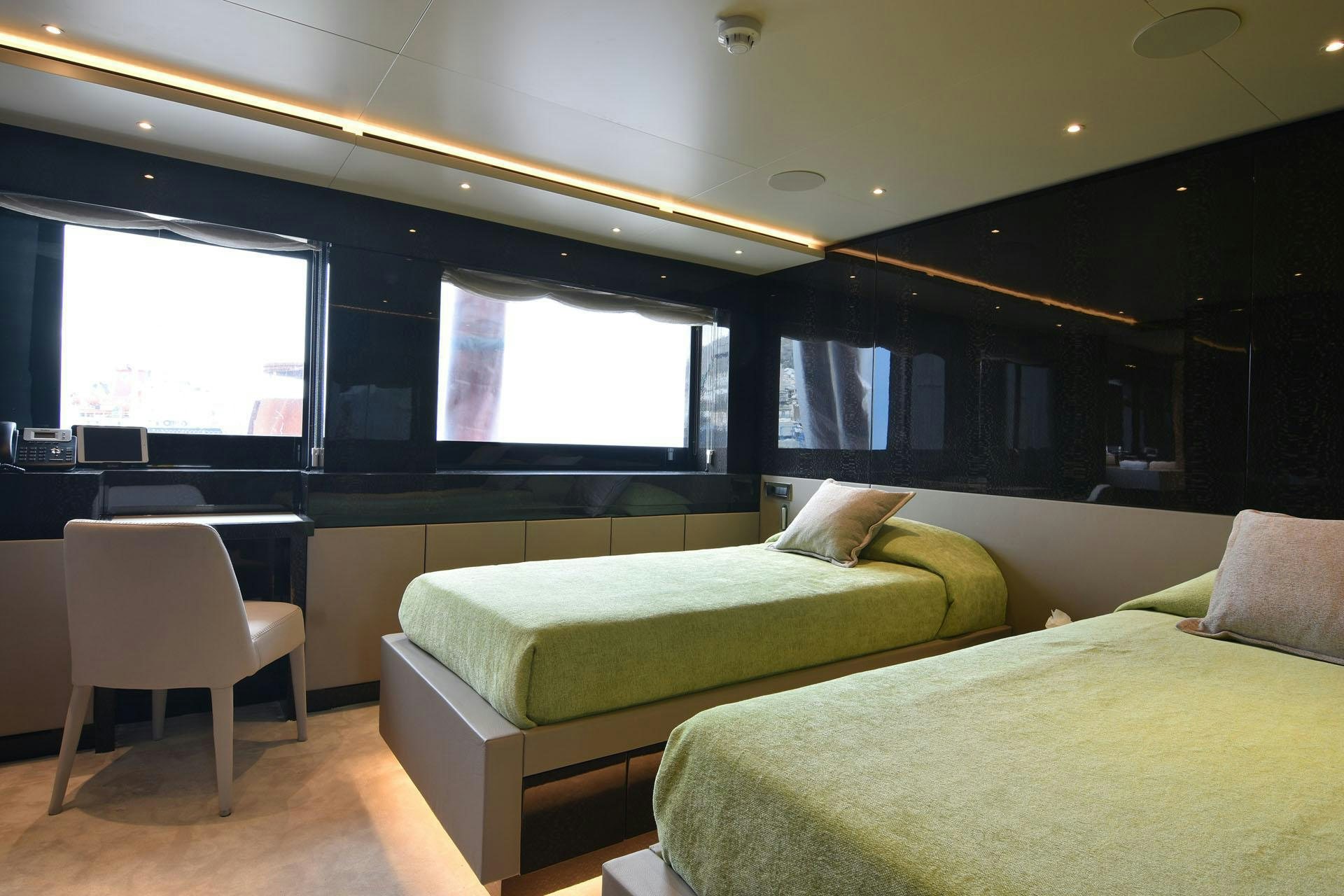 a room with two beds aboard MY EDEN Yacht for Charter
