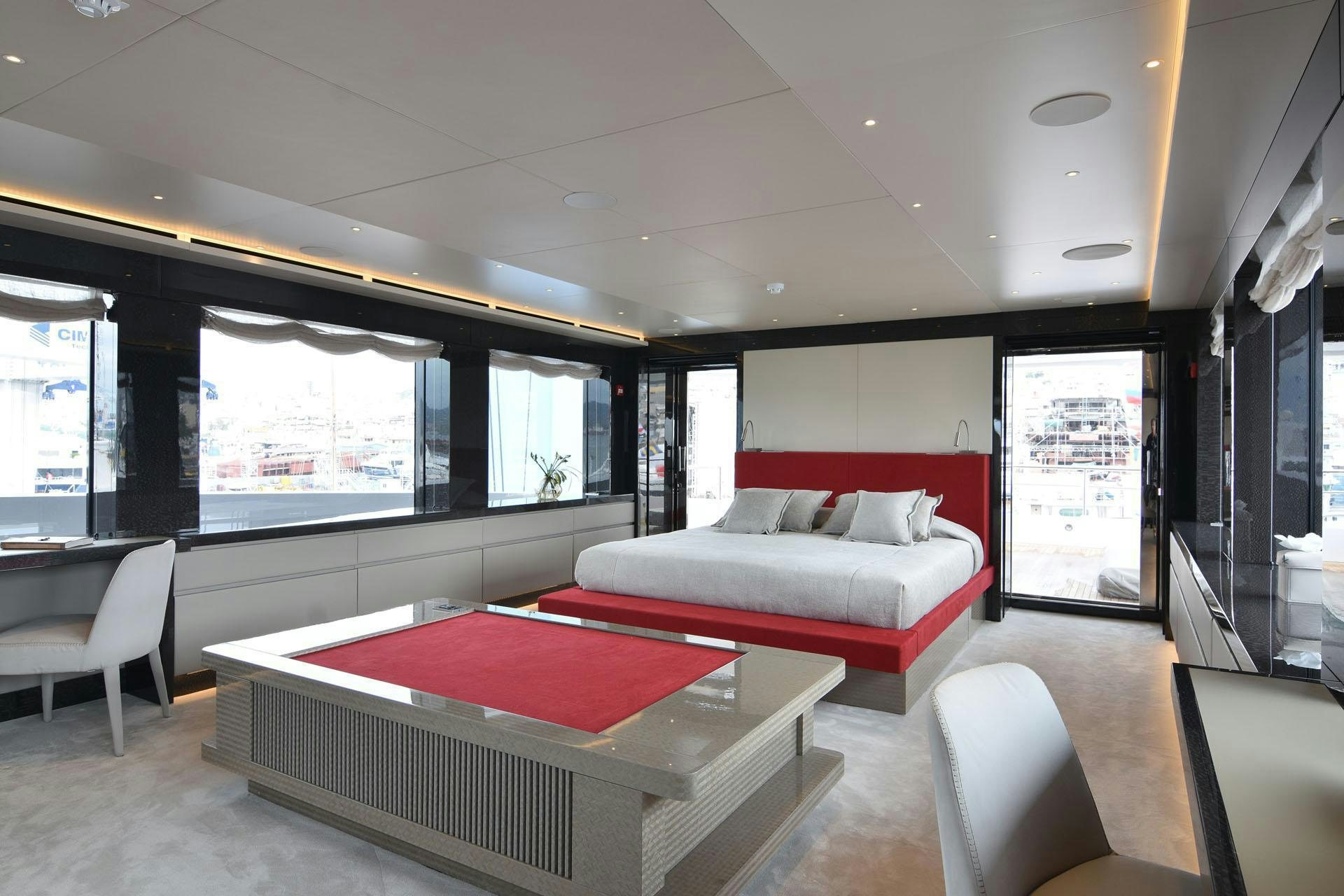 a room with a couch and a table aboard MY EDEN Yacht for Charter