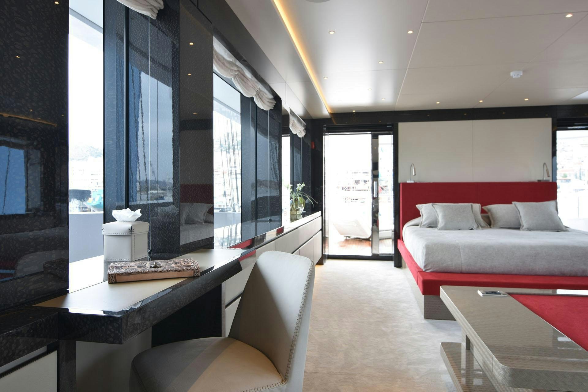 a room with a couch and a table aboard MY EDEN Yacht for Charter