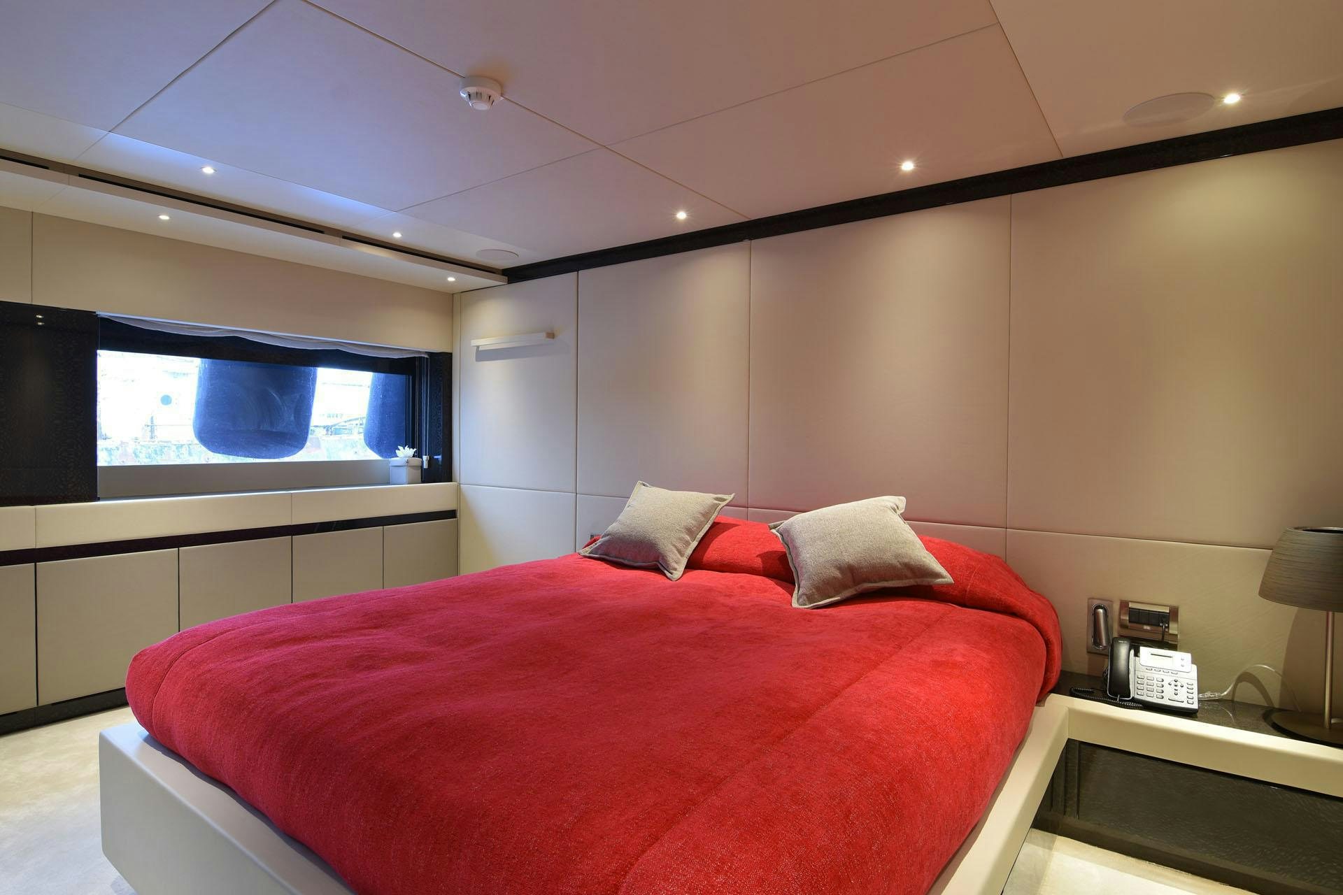 a bed in a room aboard MY EDEN Yacht for Charter