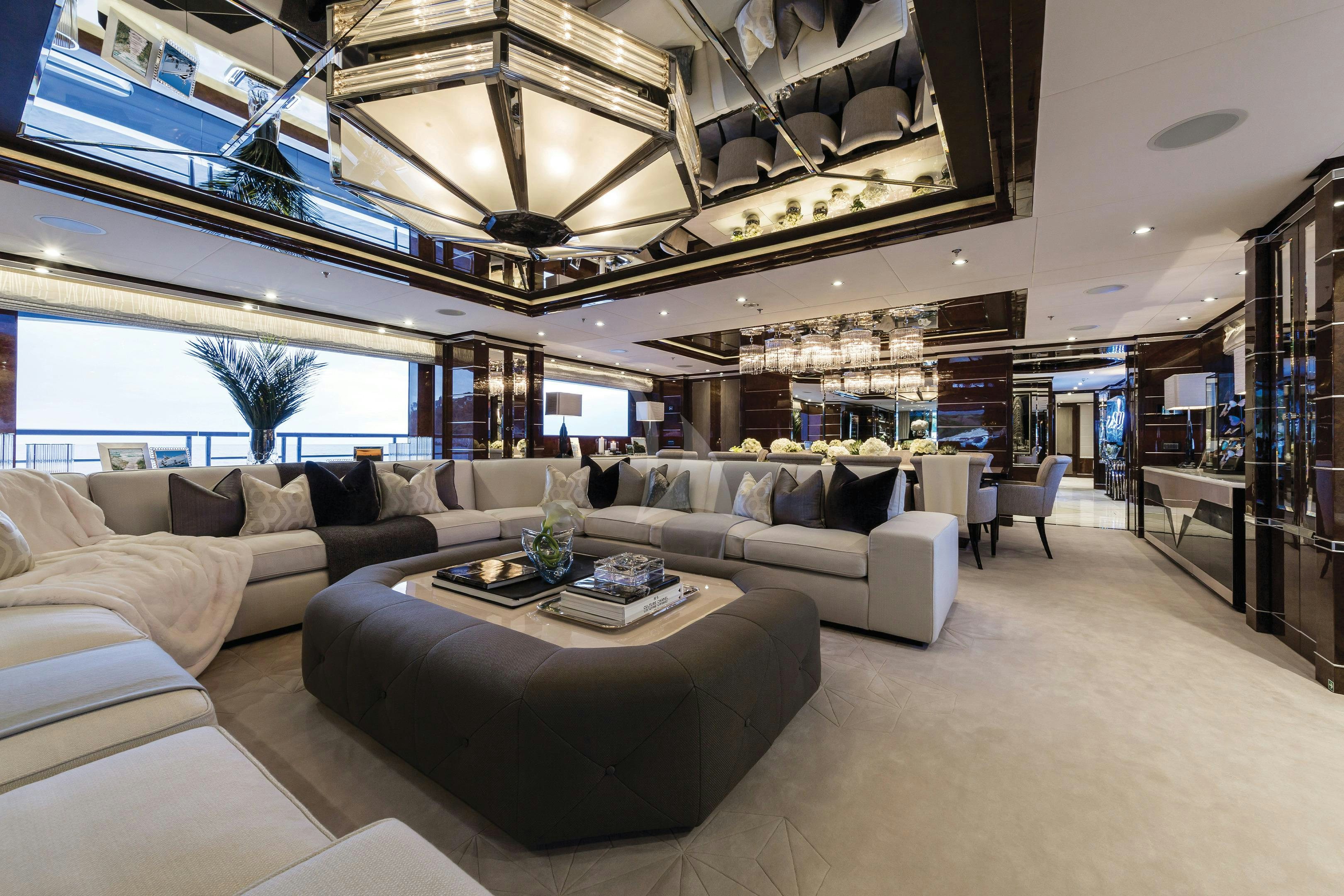 a living room with a large window aboard SOUNDWAVE Yacht for Charter