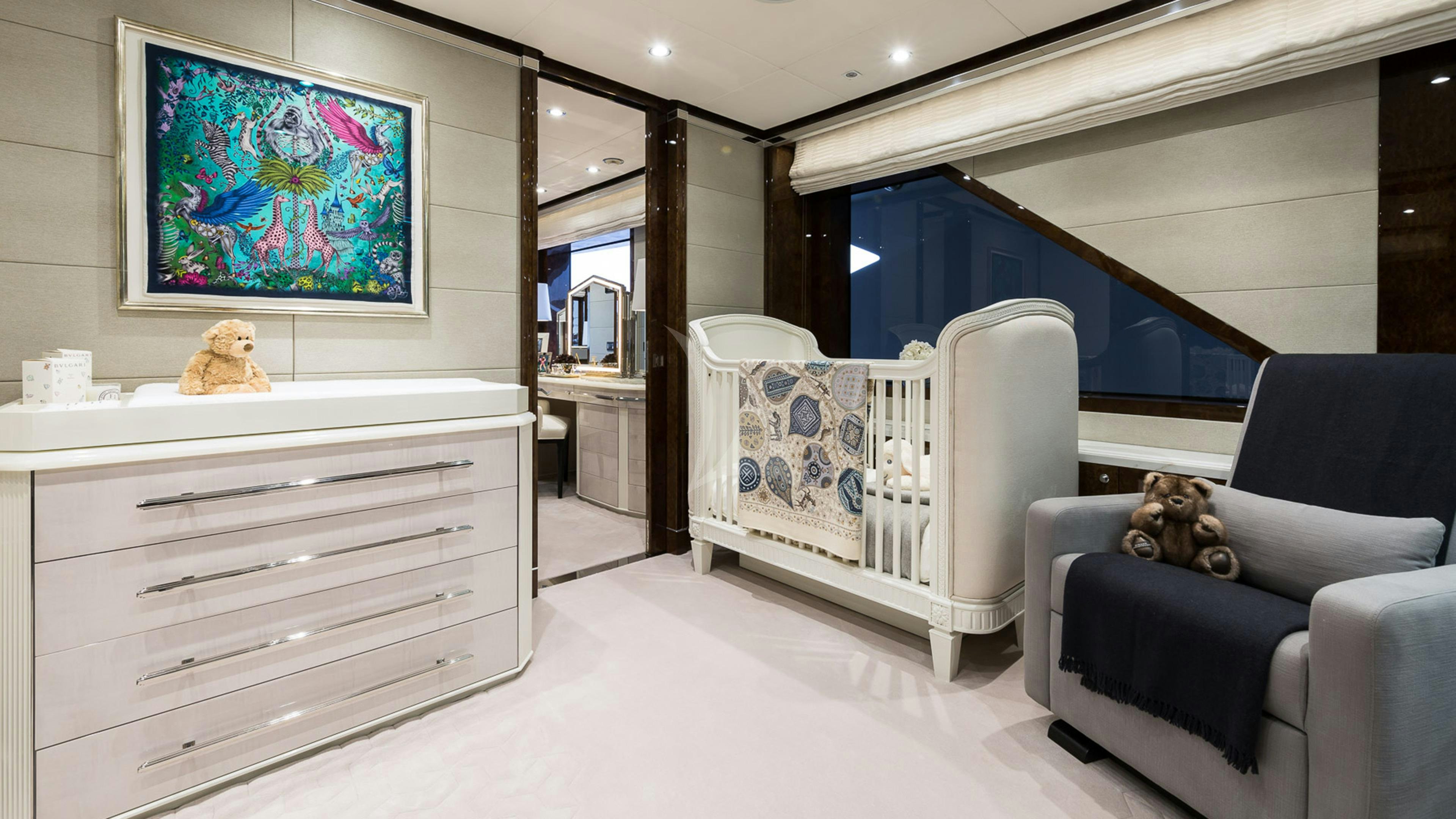 a baby crib in a room aboard SOUNDWAVE Yacht for Charter