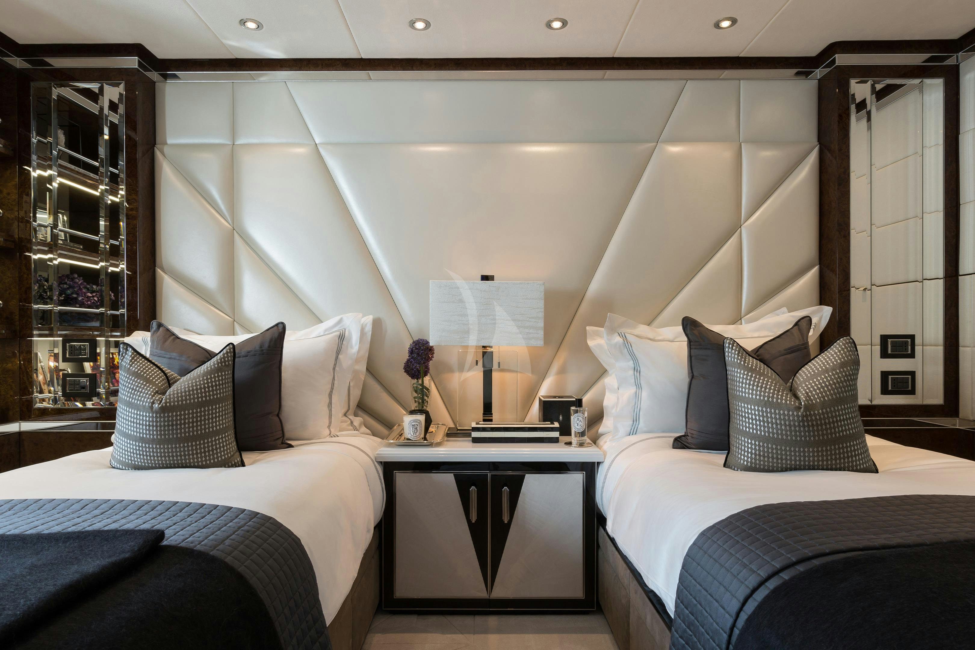 a room with two beds aboard SOUNDWAVE Yacht for Charter