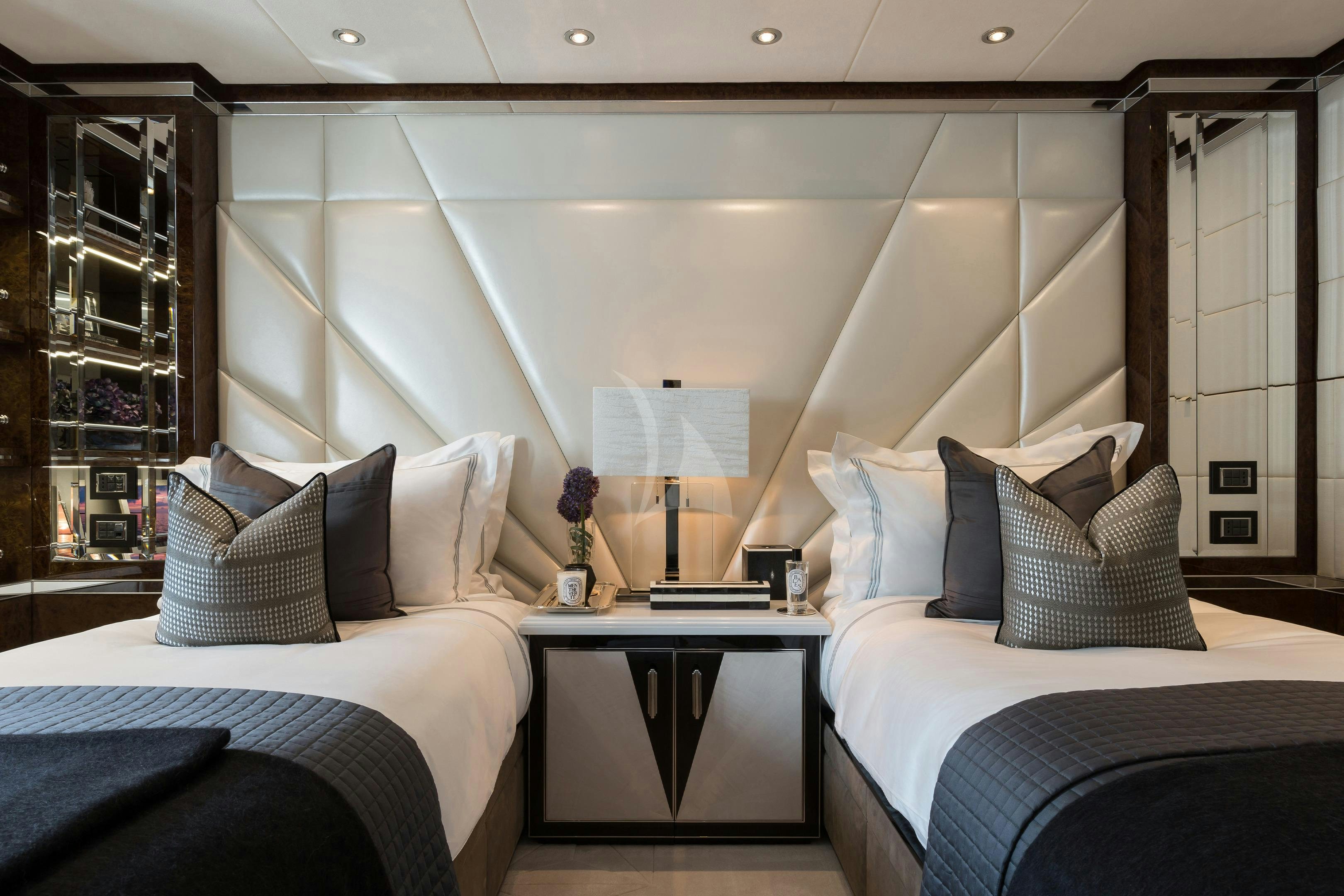 a room with two beds aboard SOUNDWAVE Yacht for Charter