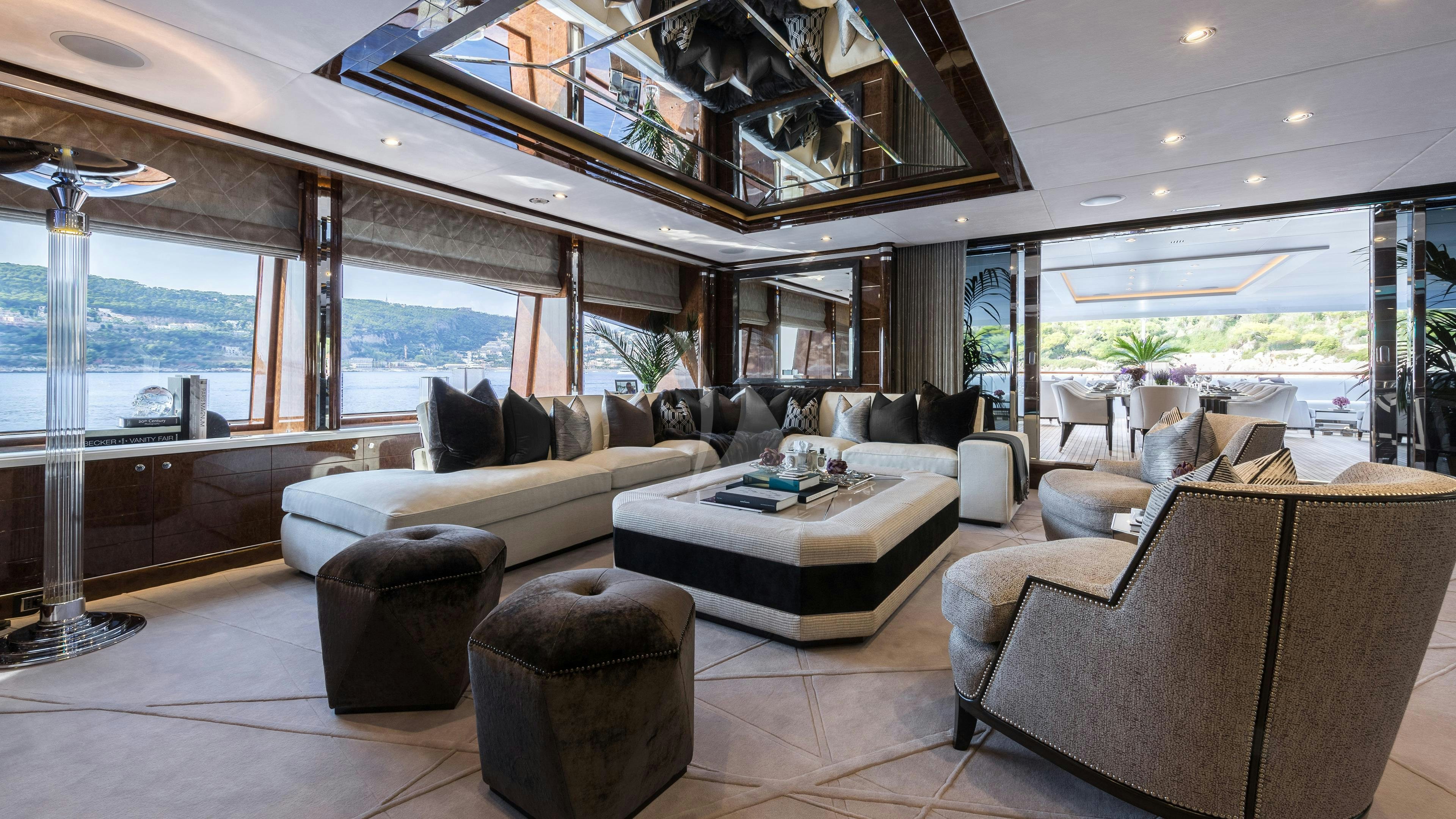 a living room with a large window aboard SOUNDWAVE Yacht for Charter