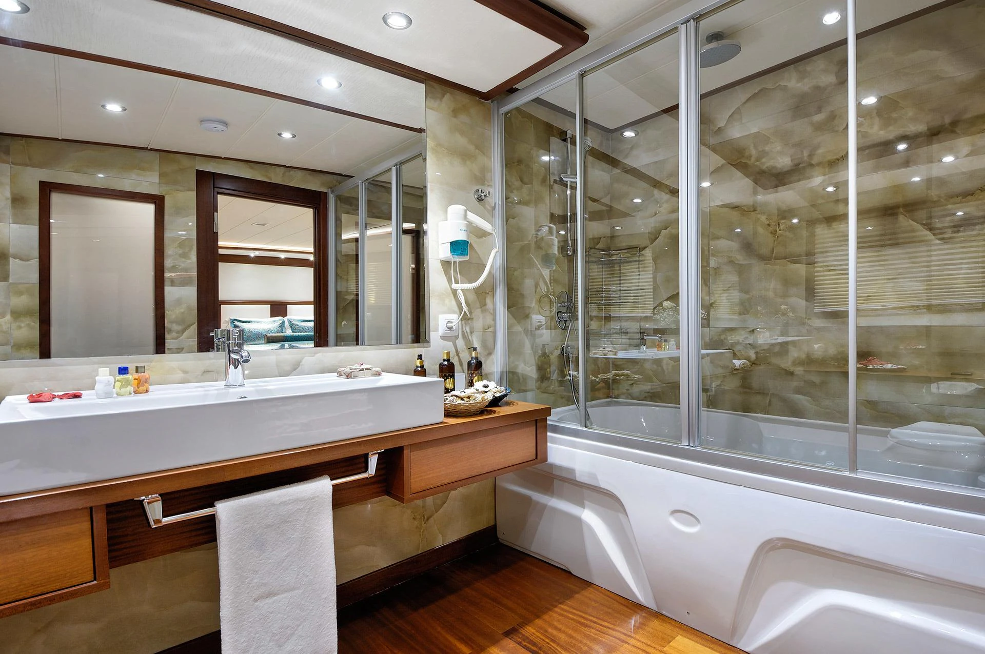 a bathroom with a glass shower aboard ALESSANDRO I Yacht for Charter