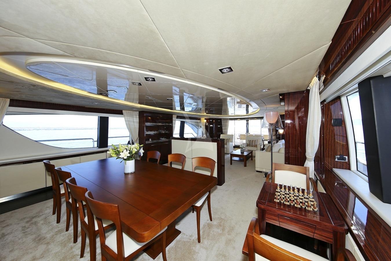 a dining room with a table and chairs aboard ARTEMY Yacht for Charter