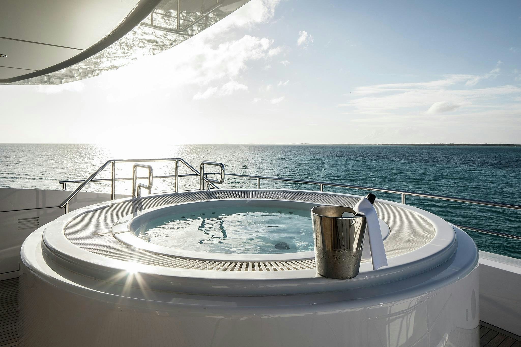a tub with a sink and a cup on it aboard HOME Yacht for Sale
