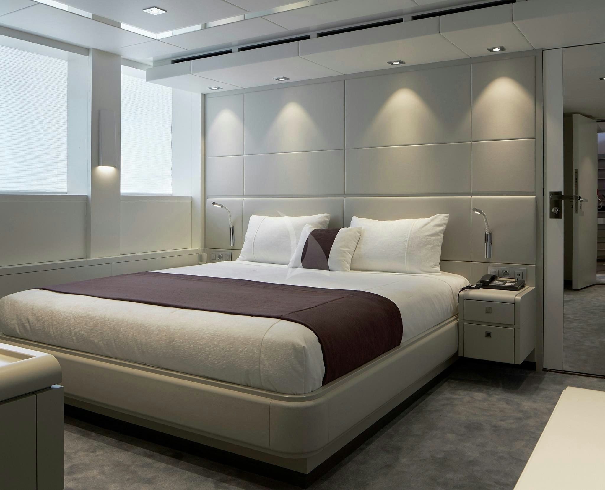 a large bed in a room aboard HOME Yacht for Sale