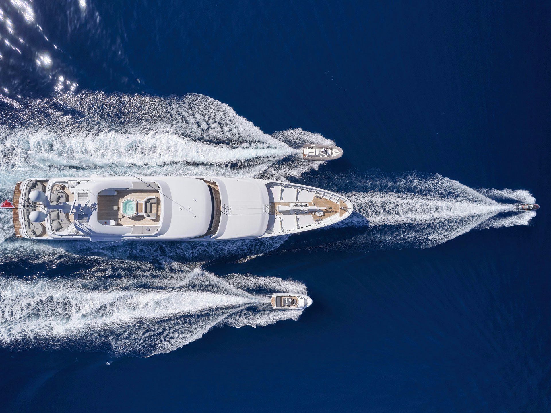 a bottle floating in the water aboard JAZ Yacht for Charter
