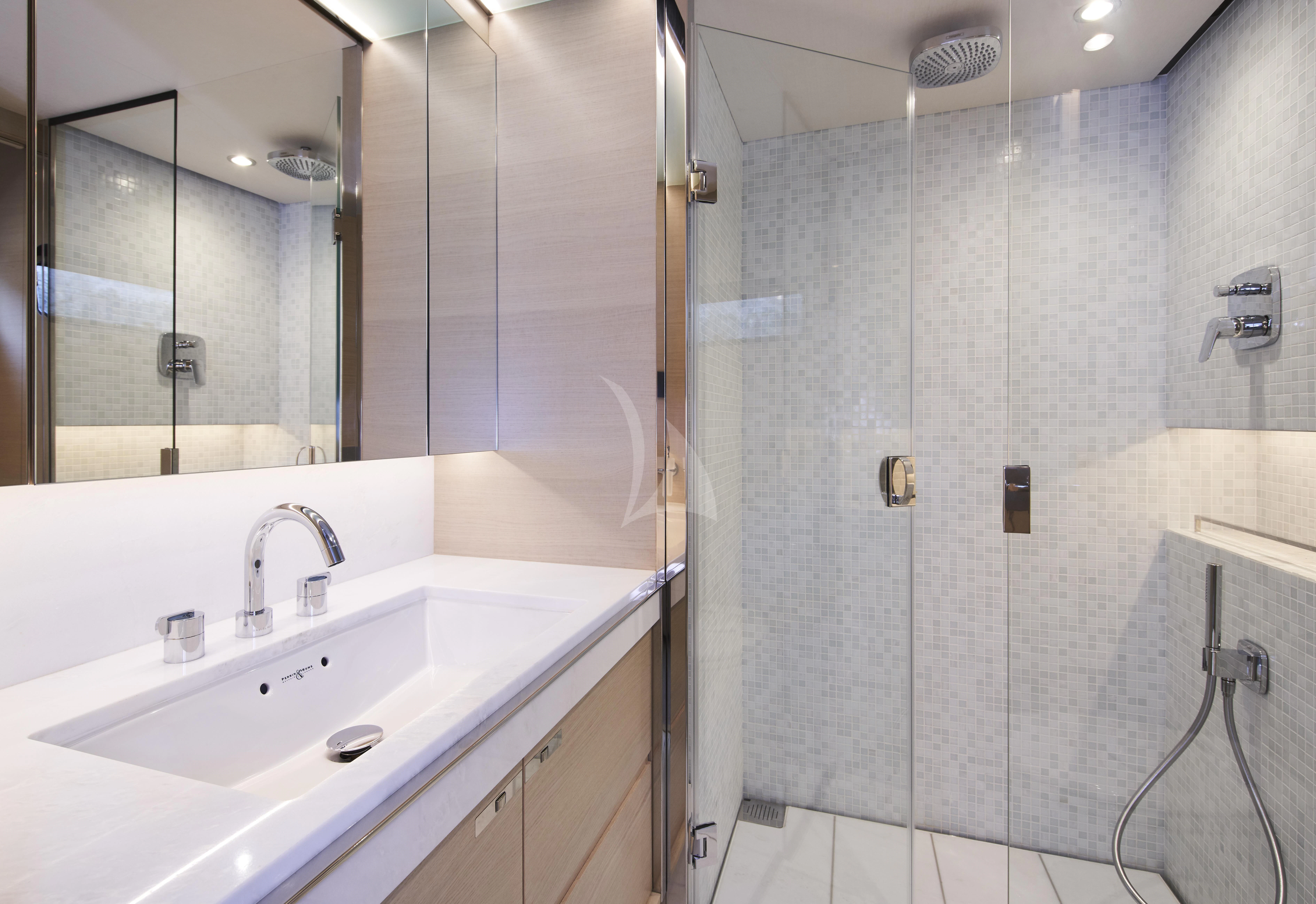 a bathroom with a glass shower aboard HALLELUJAH Yacht for Charter