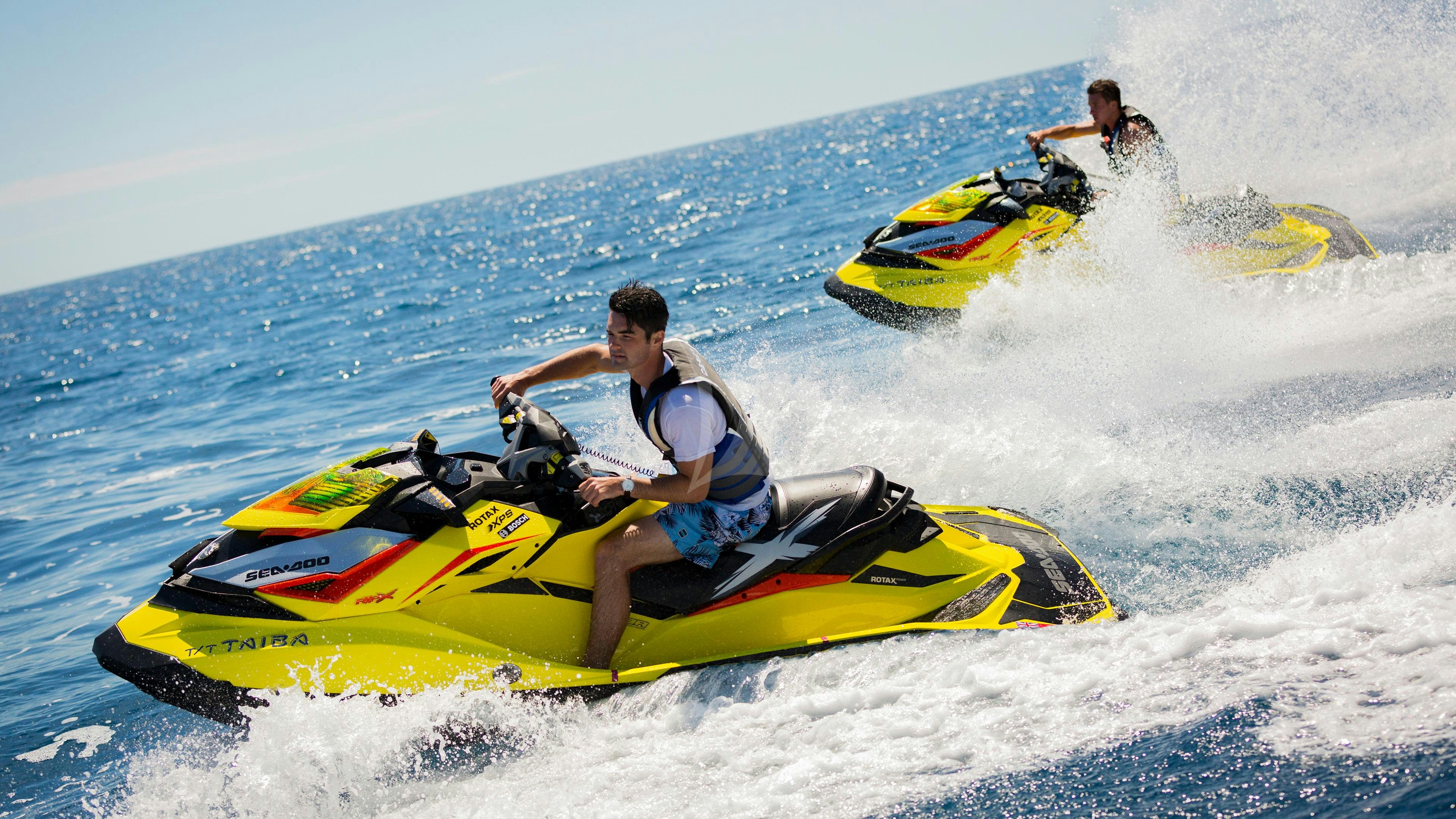 a man riding a jet ski aboard TAIBA Yacht for Charter