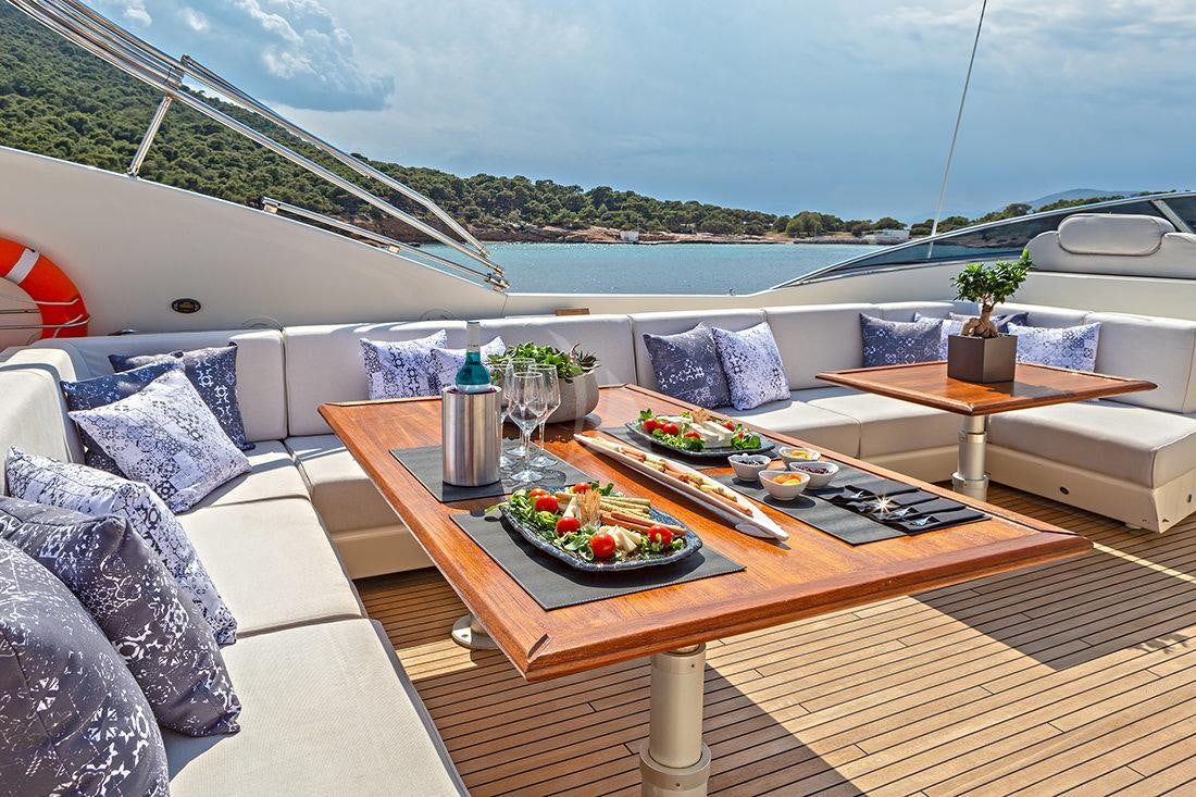 a table with food on it aboard DIVINE Yacht for Charter