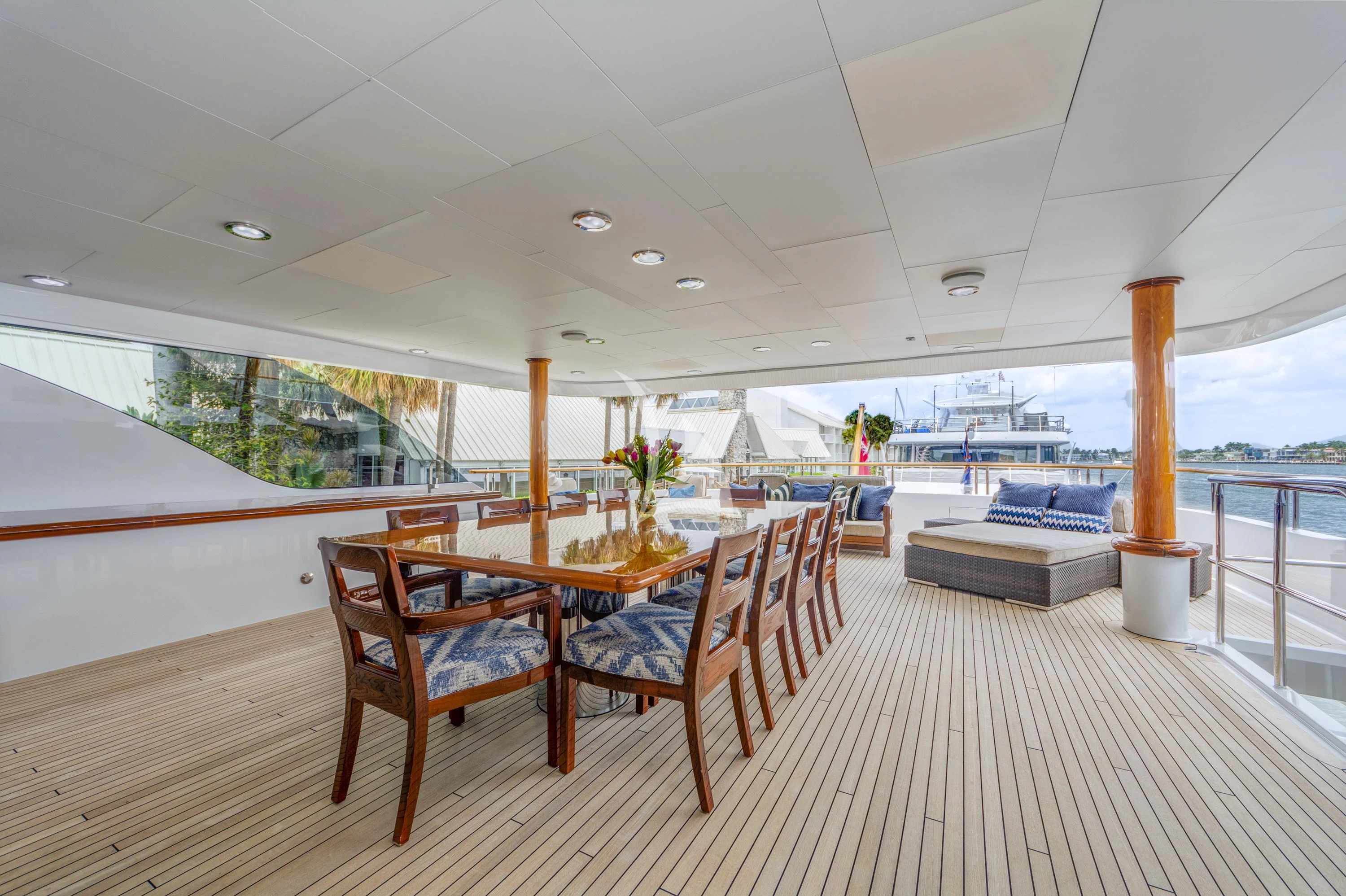 a room with a table and chairs aboard ASPEN ALTERNATIVE Yacht for Charter