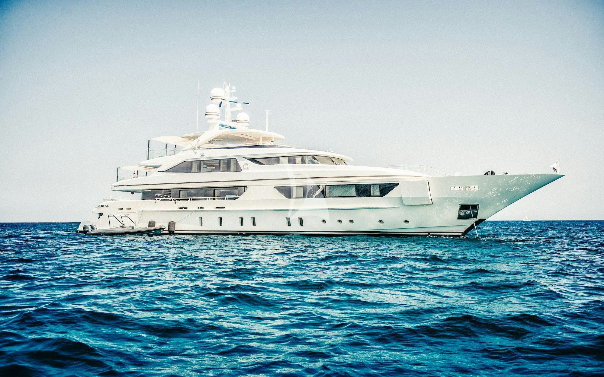 a white yacht in the water aboard SCORPION Yacht for Charter