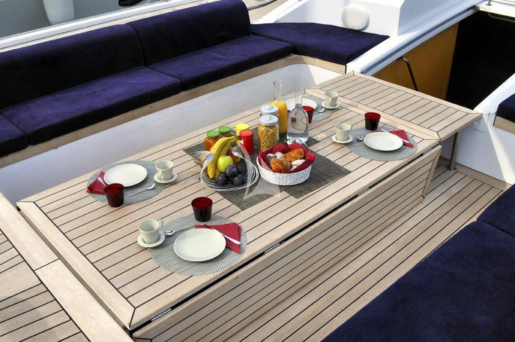 a table with food on it aboard ADESSO Yacht for Charter