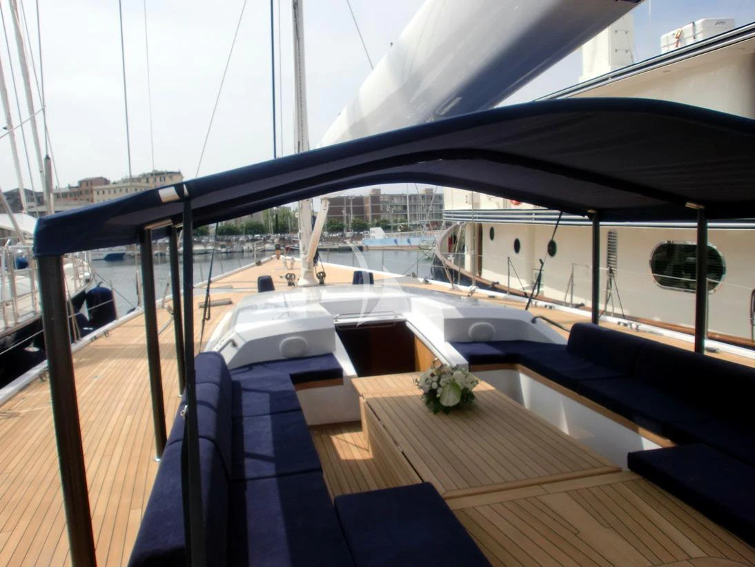 a room with a table and chairs aboard ADESSO Yacht for Charter