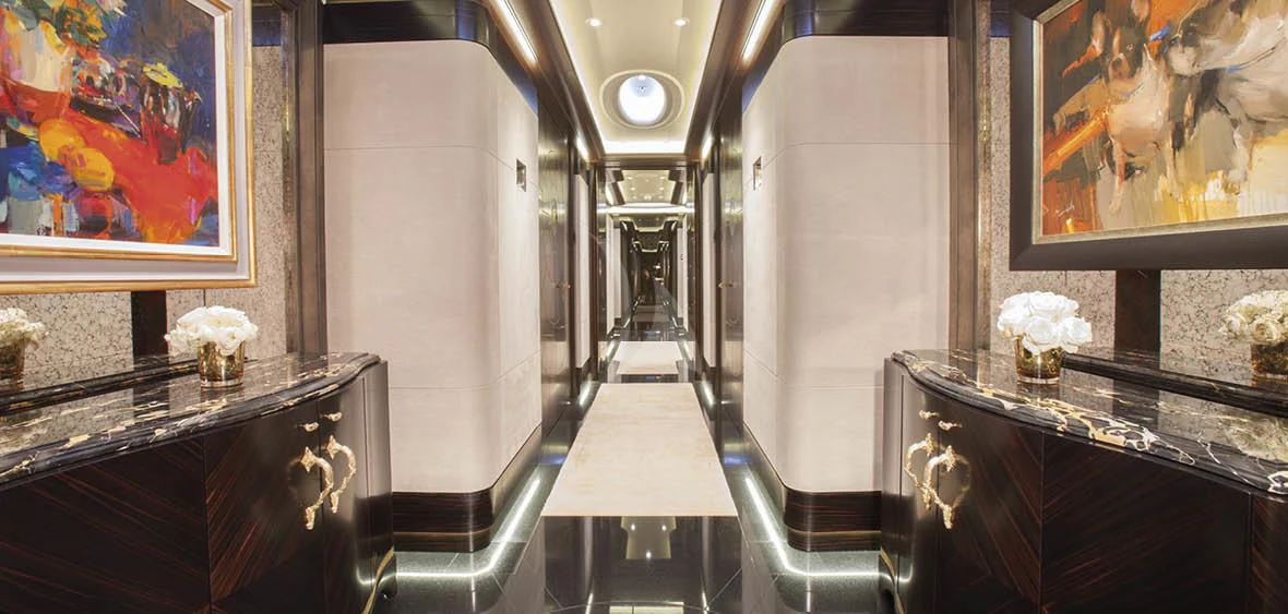 a room with a desk and a chair aboard WHISPER Yacht for Charter