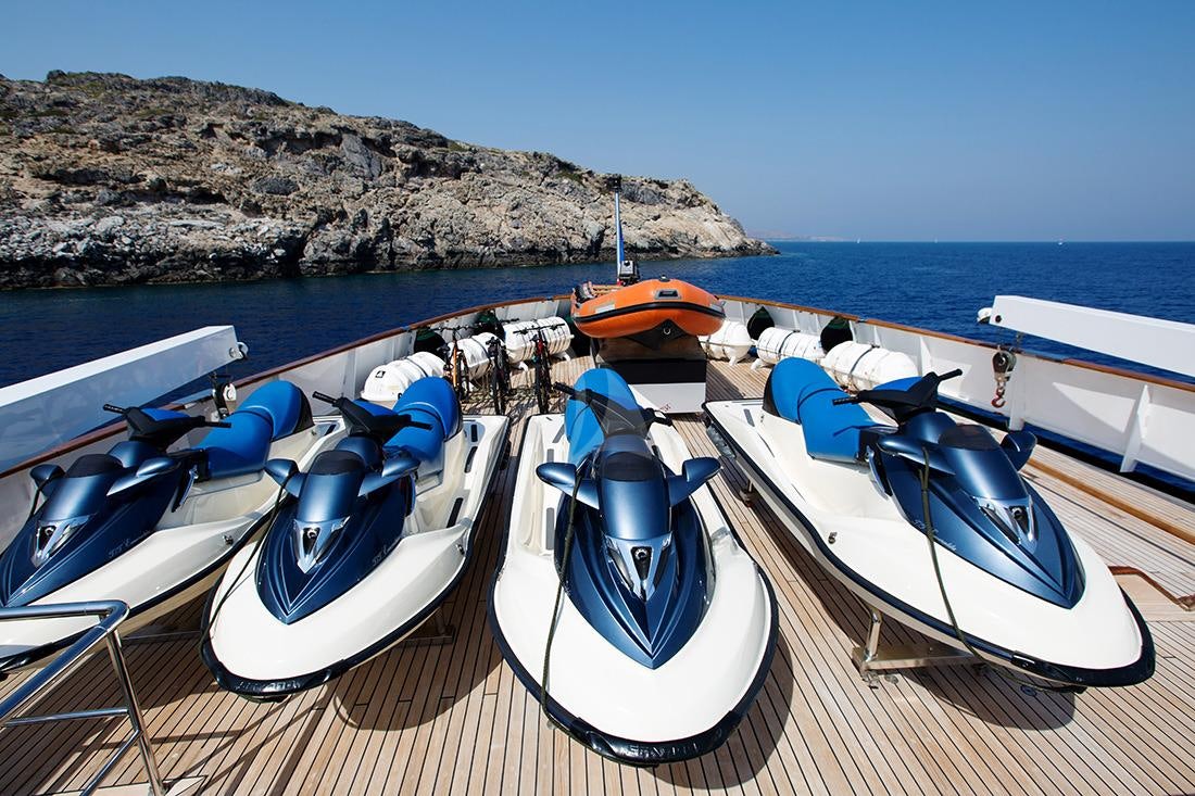 boats parked on a dock aboard ESMERALDA Yacht for Charter