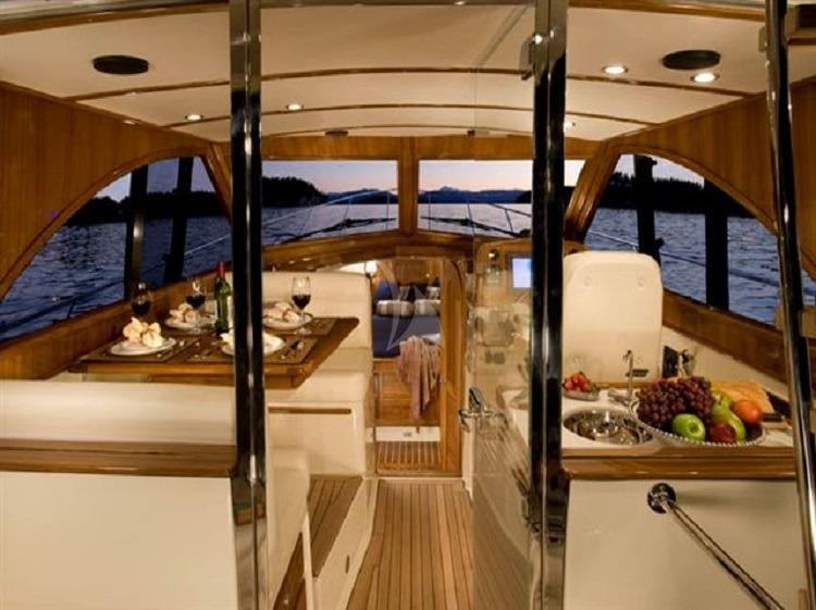 a kitchen with a glass wall aboard PIONEER Yacht for Charter