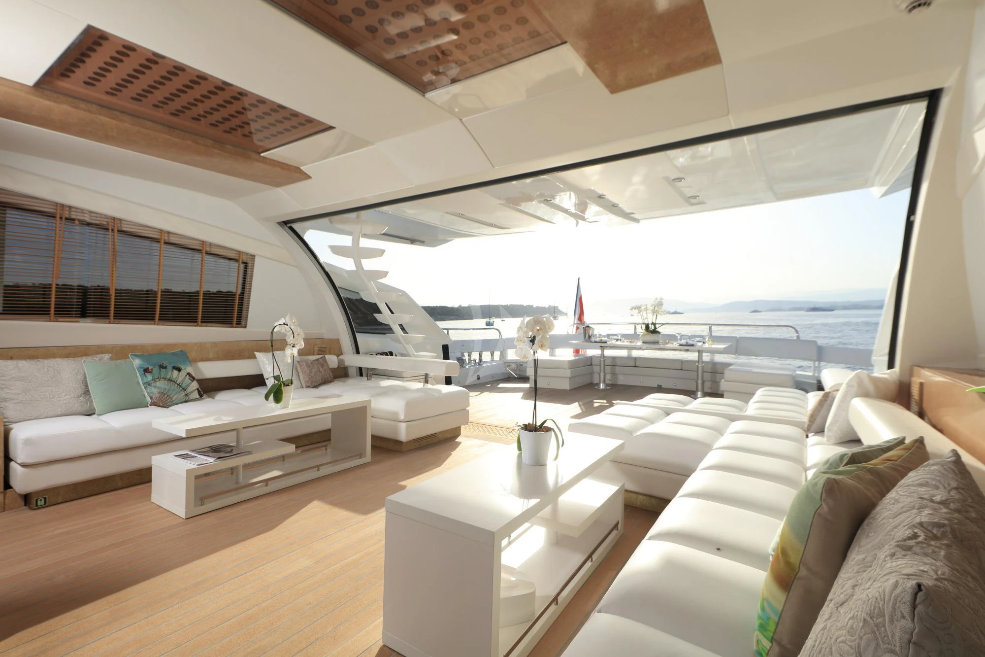 a living room with a large open window aboard ASTRO Yacht for Charter