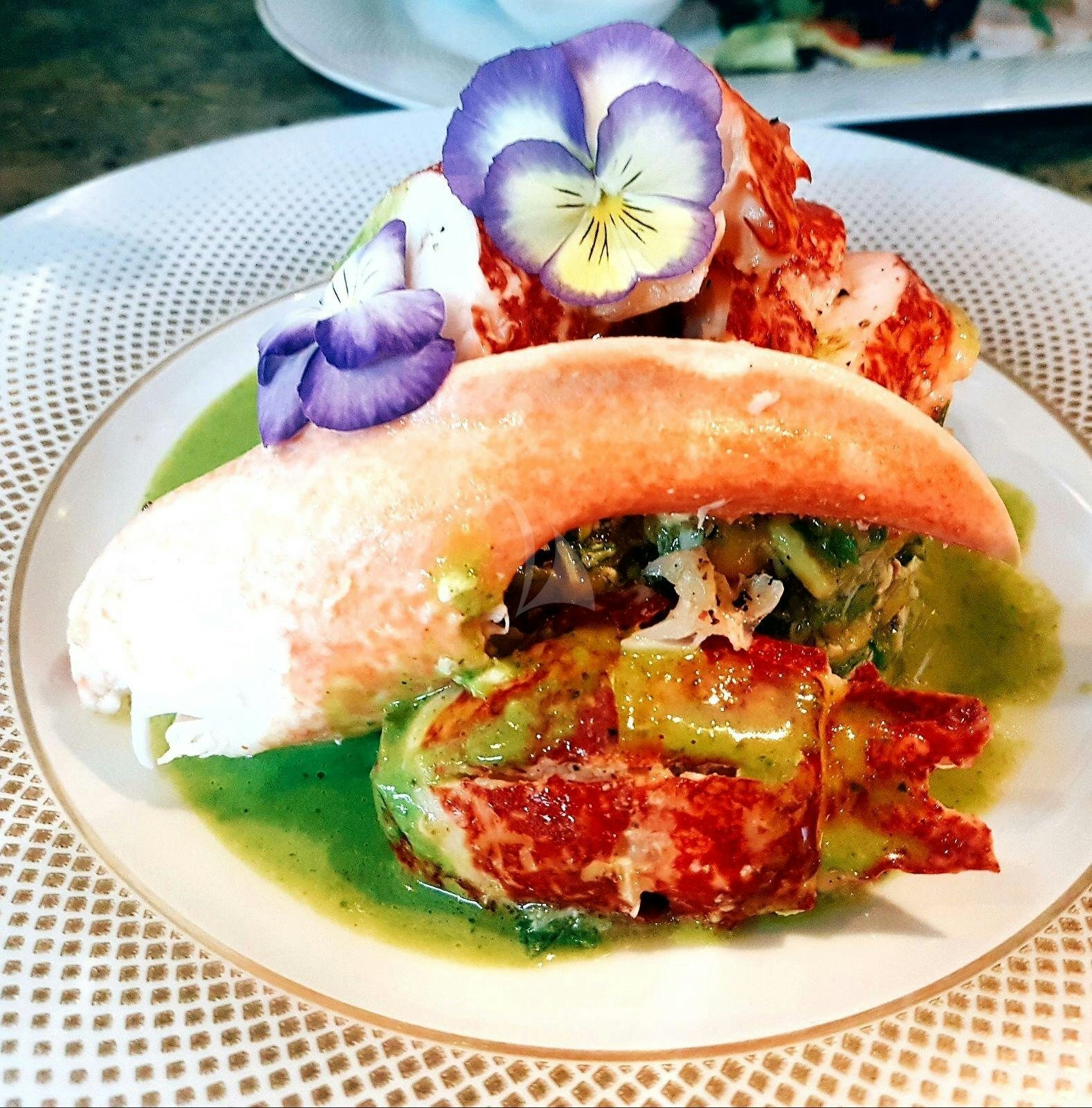 a plate of food aboard JOY ME Yacht for Charter