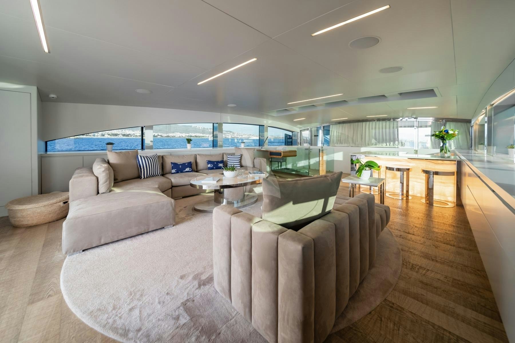 a living room with a large window aboard SEA WOLF Yacht for Charter