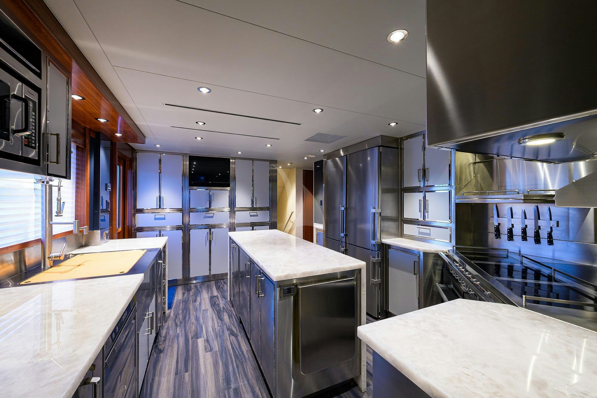 a kitchen with a bar and a bar aboard LADY JJ Yacht for Charter